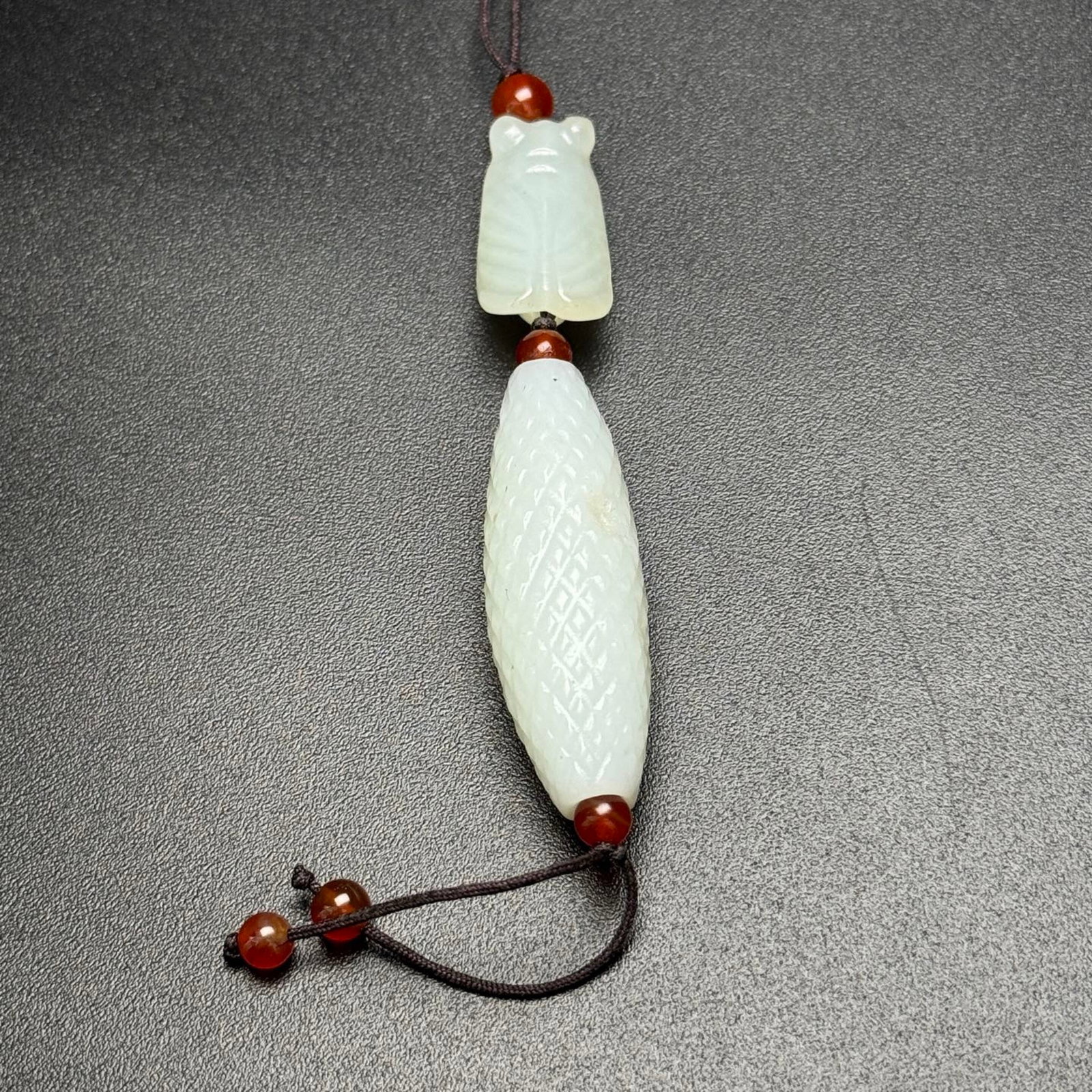 An Exquisite White Jade Cicada Pendant: An Exquisite White Jade Cicada Pendant,Qing Dynasty,China,Size:75mmx15mmx15mm,Weight:21g 白玉蝉挂件,中国清代