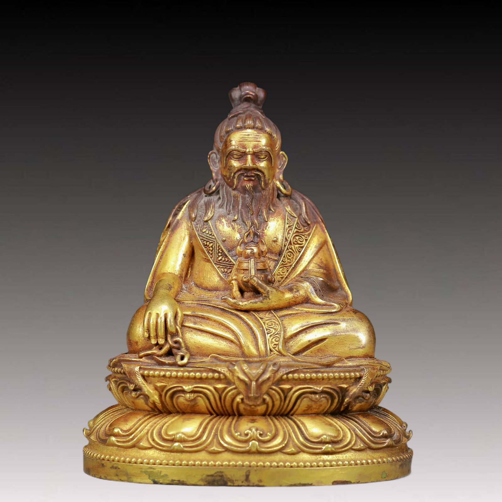 A Solemn Gilt Bronze Buddha Statue: A Solemn Gilt Bronze Buddha Statue,Ming Dynasty, China,Size:3.1inx2.6inx4.1in,Weight:495g 铜鎏金佛像，明代