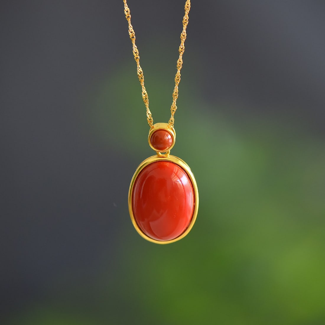 An Exquisite Sterling Silver-Gold Plated Inlaid Cinnabar Necklace: An Exquisite Sterling Silver-Gold Plated Inlaid Cinnabar Necklace,Size:15mmx20mm 纯银镀金镶朱砂项链