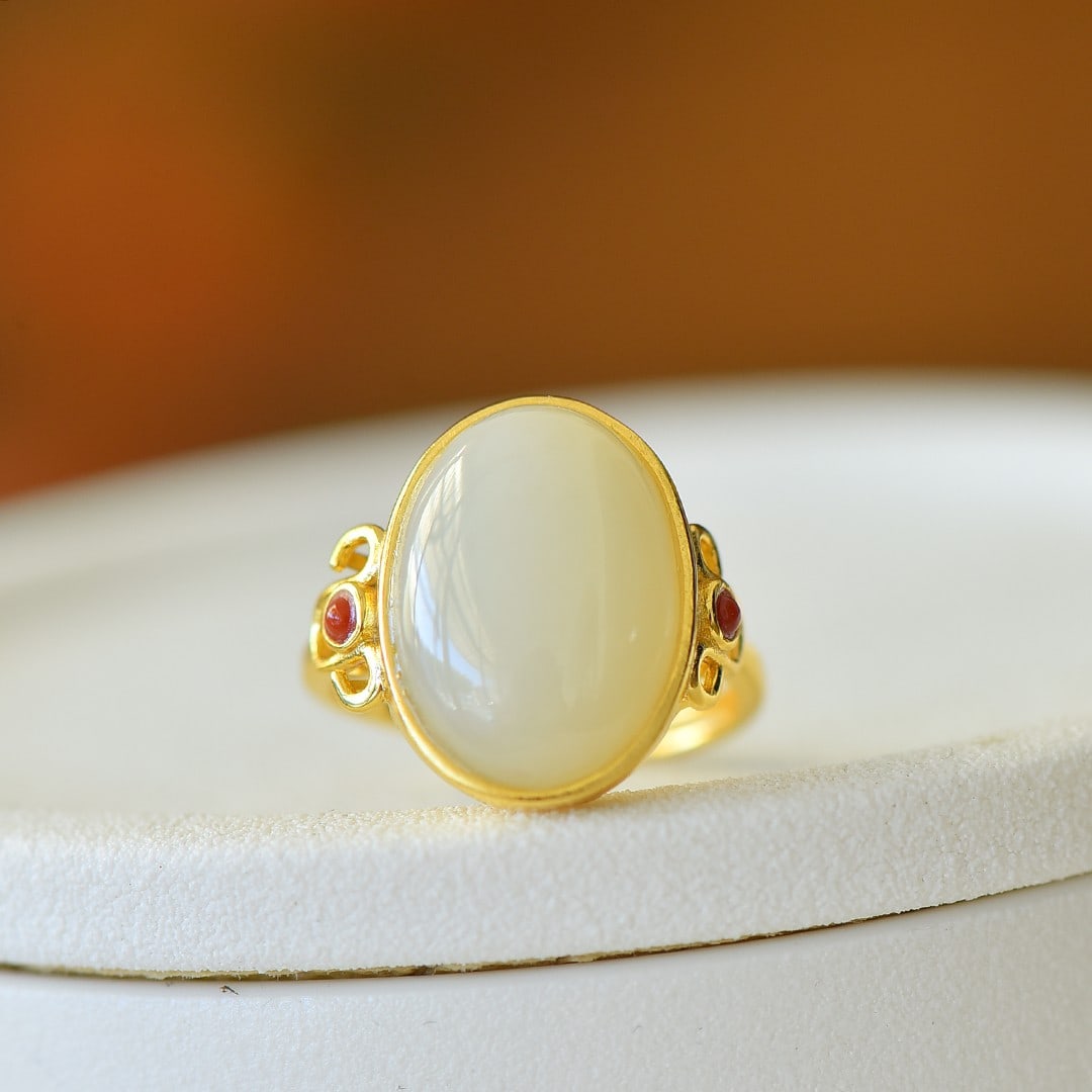 An Exquisite Sterling Silver-Gold Plated Inlaid White Jade Ring: An Exquisite Sterling Silver-Gold Plated Inlaid White Jade Ring,Size:13mmx18mm 纯银镀金镶白玉戒指