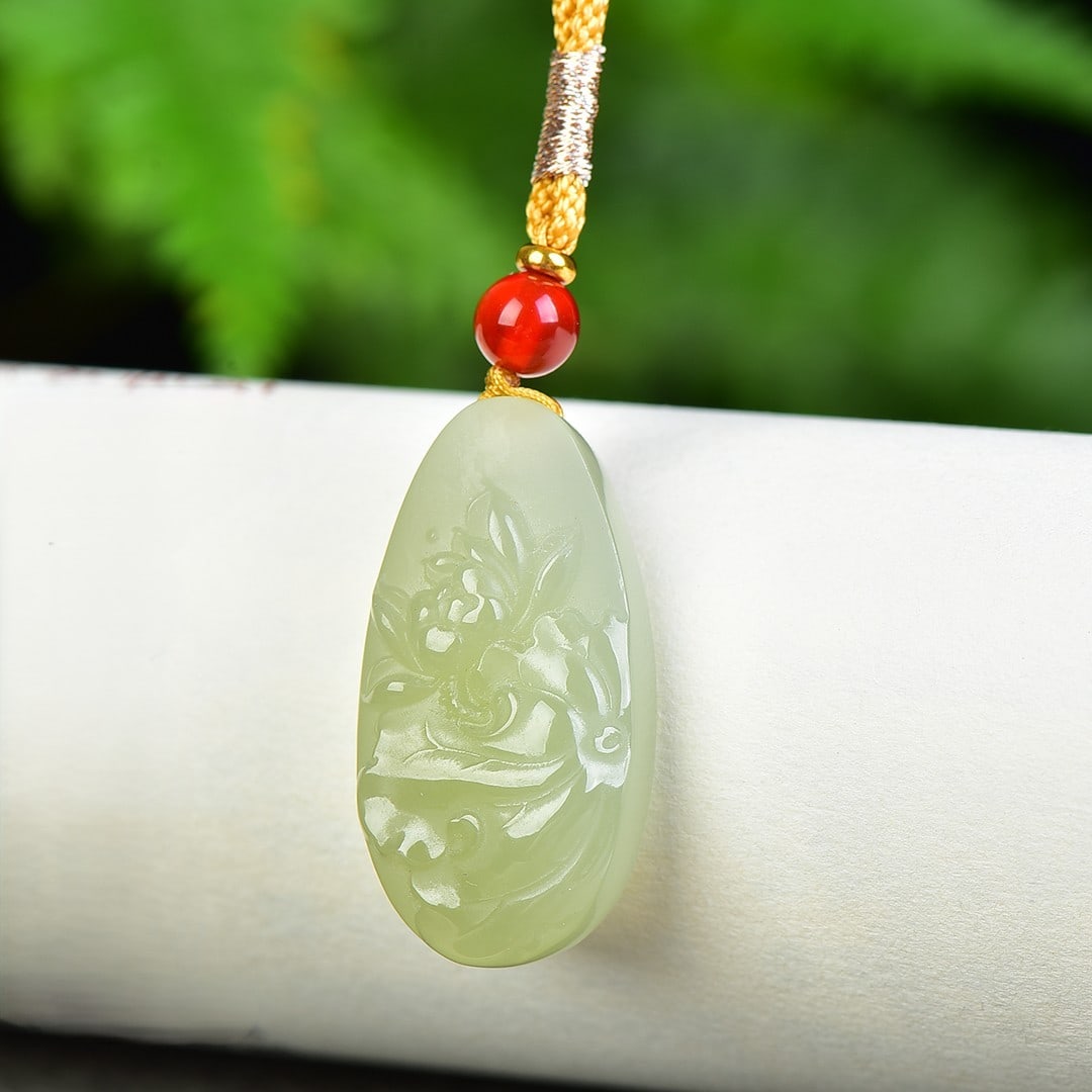 An Exquisite Greenish Jade Lotus Pattern Pendant: An Exquisite Greenish Jade Lotus Pattern Pendant,Size:18mmx34mm 青玉荷花纹挂件