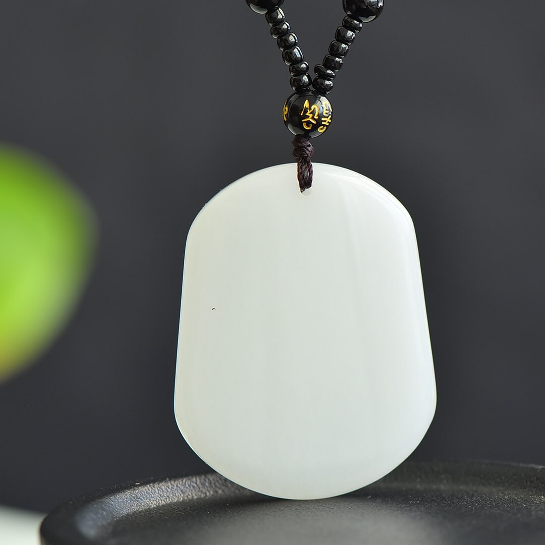 An Exquisite White Jade Pendant: An Exquisite White Jade Pendant,Size:51mmx41mm 白玉挂件
