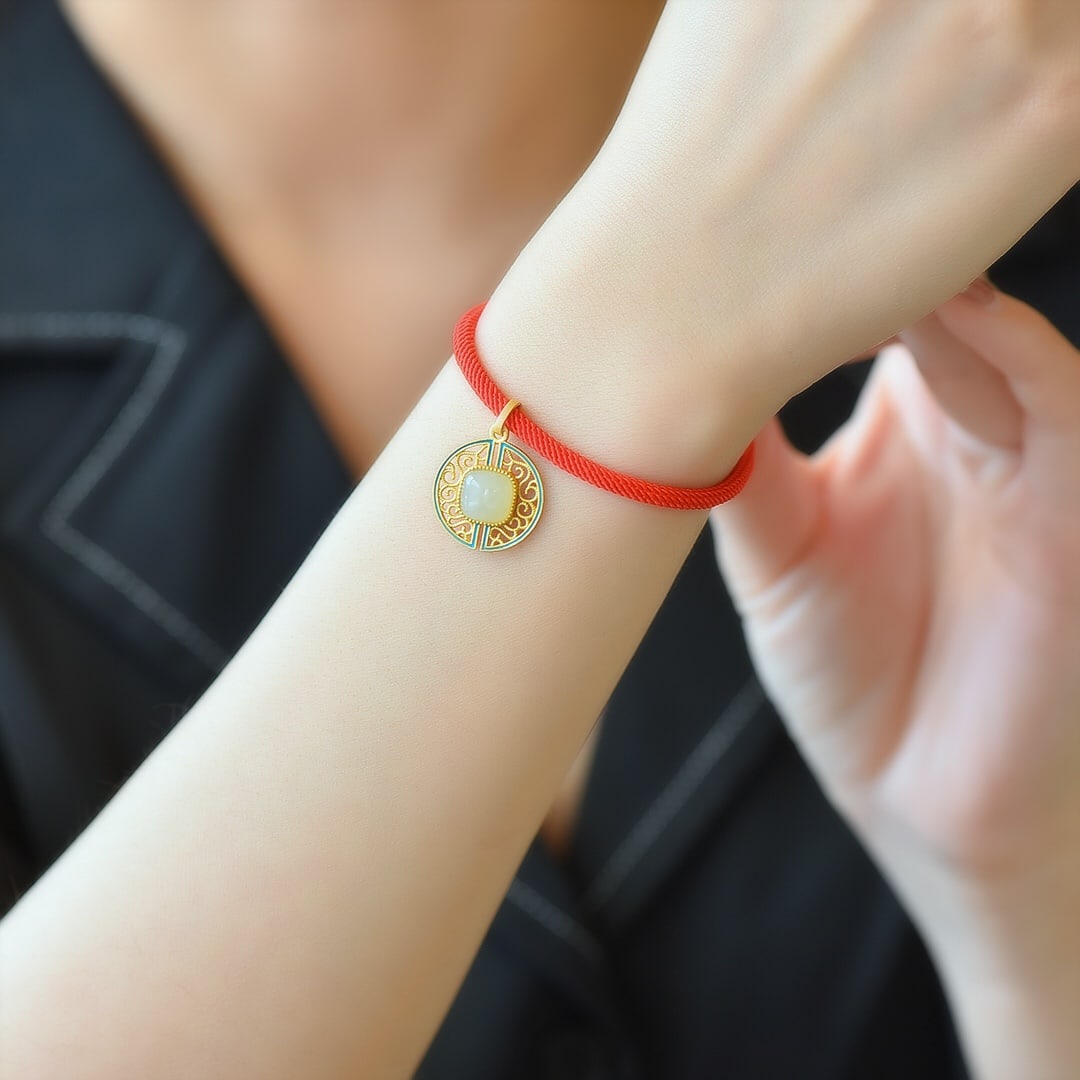 An Exquisite Sterling Silver-Gold Plated Inlaid White Jade Bracelet: An Exquisite Sterling Silver-Gold Plated Inlaid White Jade Bracelet 纯银镀金镶白玉手链