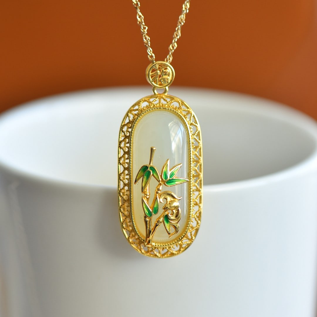 An Exquisite Sterling Silver-Gold Plated Inlaid White Jade Enamel Pendant: An Exquisite Sterling Silver-Gold Plated Inlaid White Jade Enamel Pendant,Size:11mmx28mm 纯银镀金镶白玉珐琅吊坠