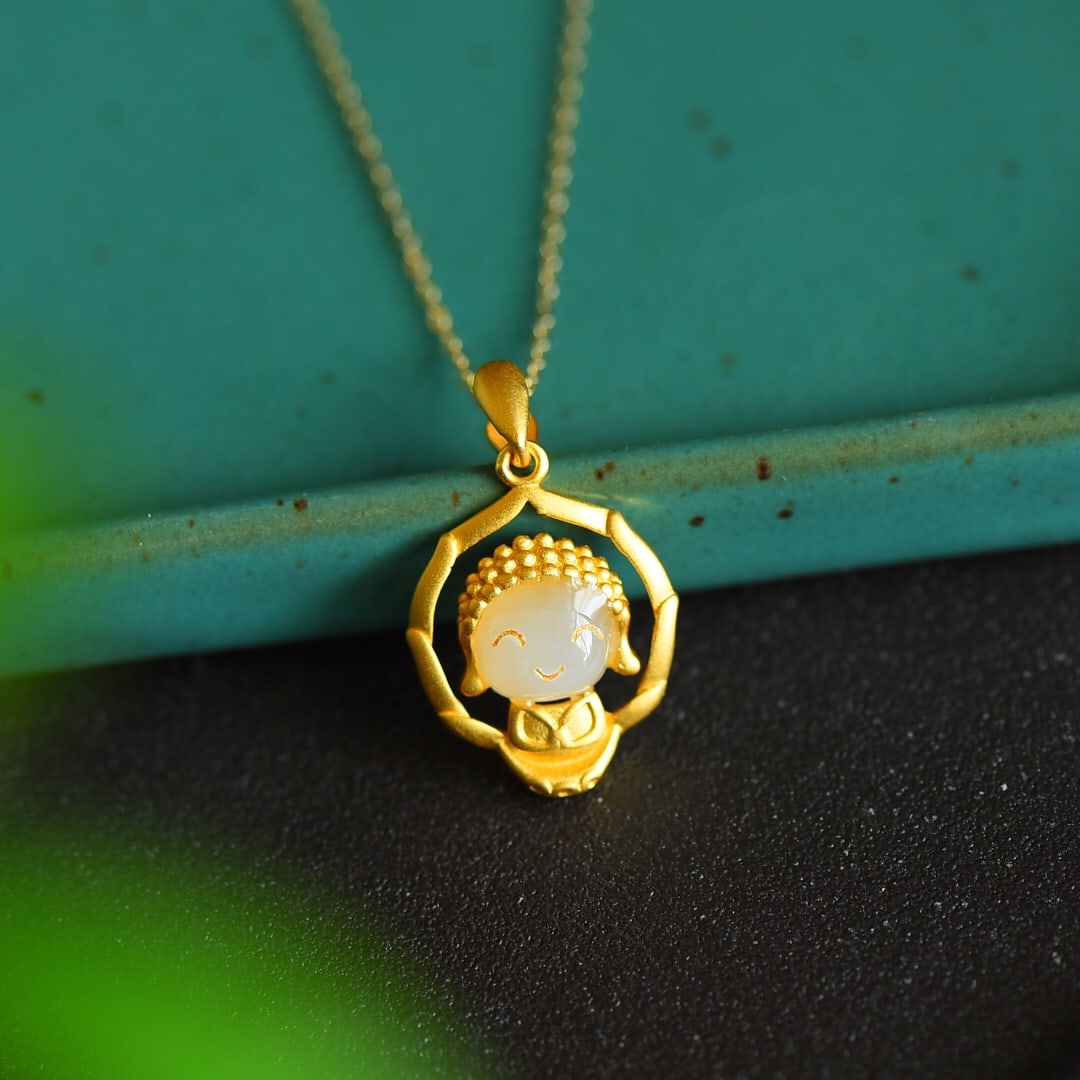 An Exquisite Sterling Silver-Gold Plated Inlaid White Jade Pendant: An Exquisite Sterling Silver-Gold Plated Inlaid White Jade Pendant 纯银镀金镶白玉吊坠