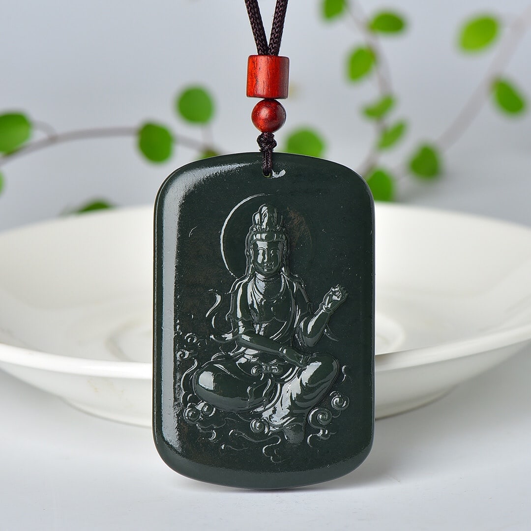 An Exquisite Sapphire Avalokitesvara Pattern Pendant: An Exquisite Sapphire Avalokitesvara Pattern Pendant,Size:42mmx64mm (寓意)寓意吉祥 玉脂温润 青玉观音像纹