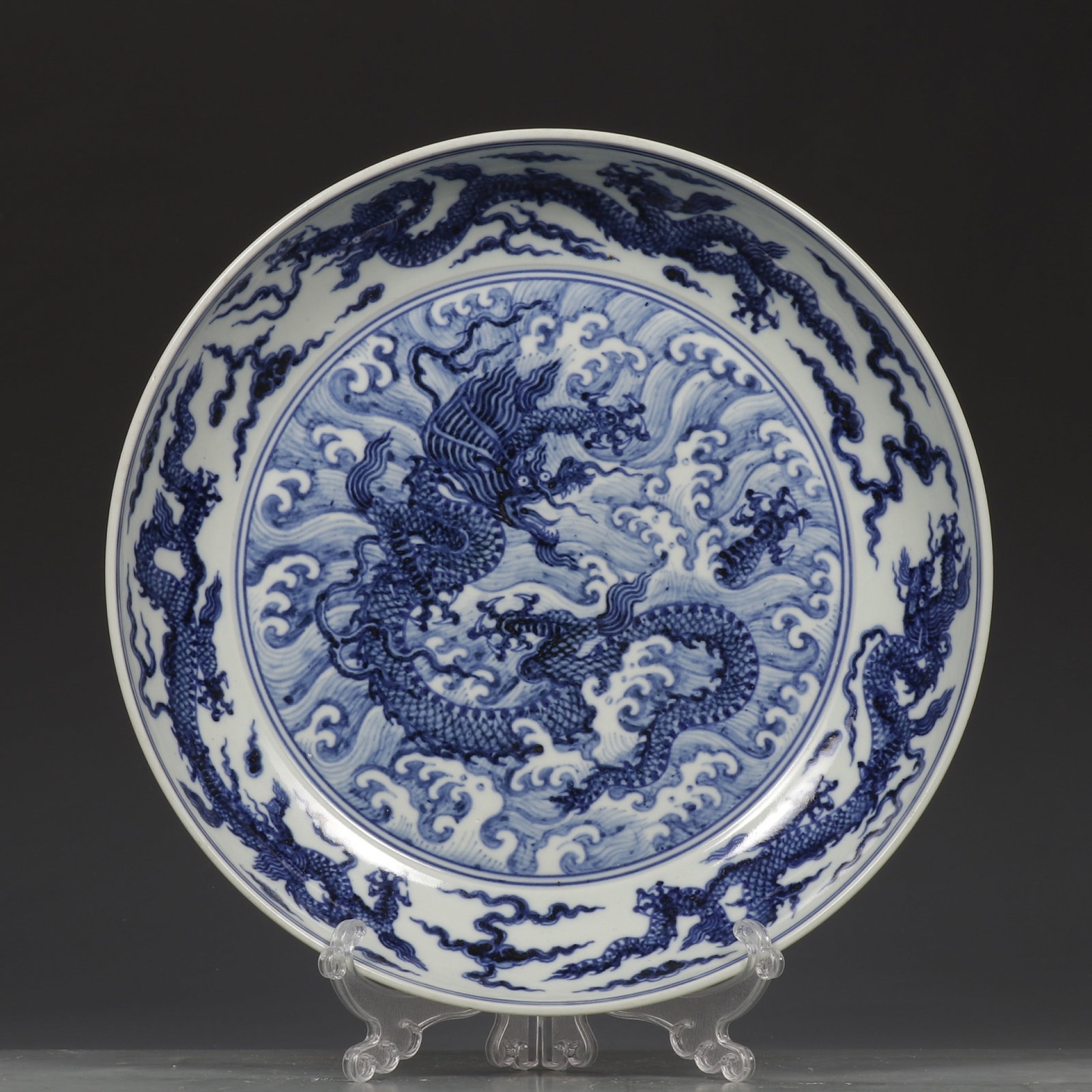 An Exquisite Blue and White Seawater and Dragon Pattern Plate: An Exquisite Blue and White Seawater and Dragon Pattern Plate,Ming Dynasty,China ,Xuande Six-character Mark,Size:2.5inx12.2in 青花海水龙纹盘,中国&