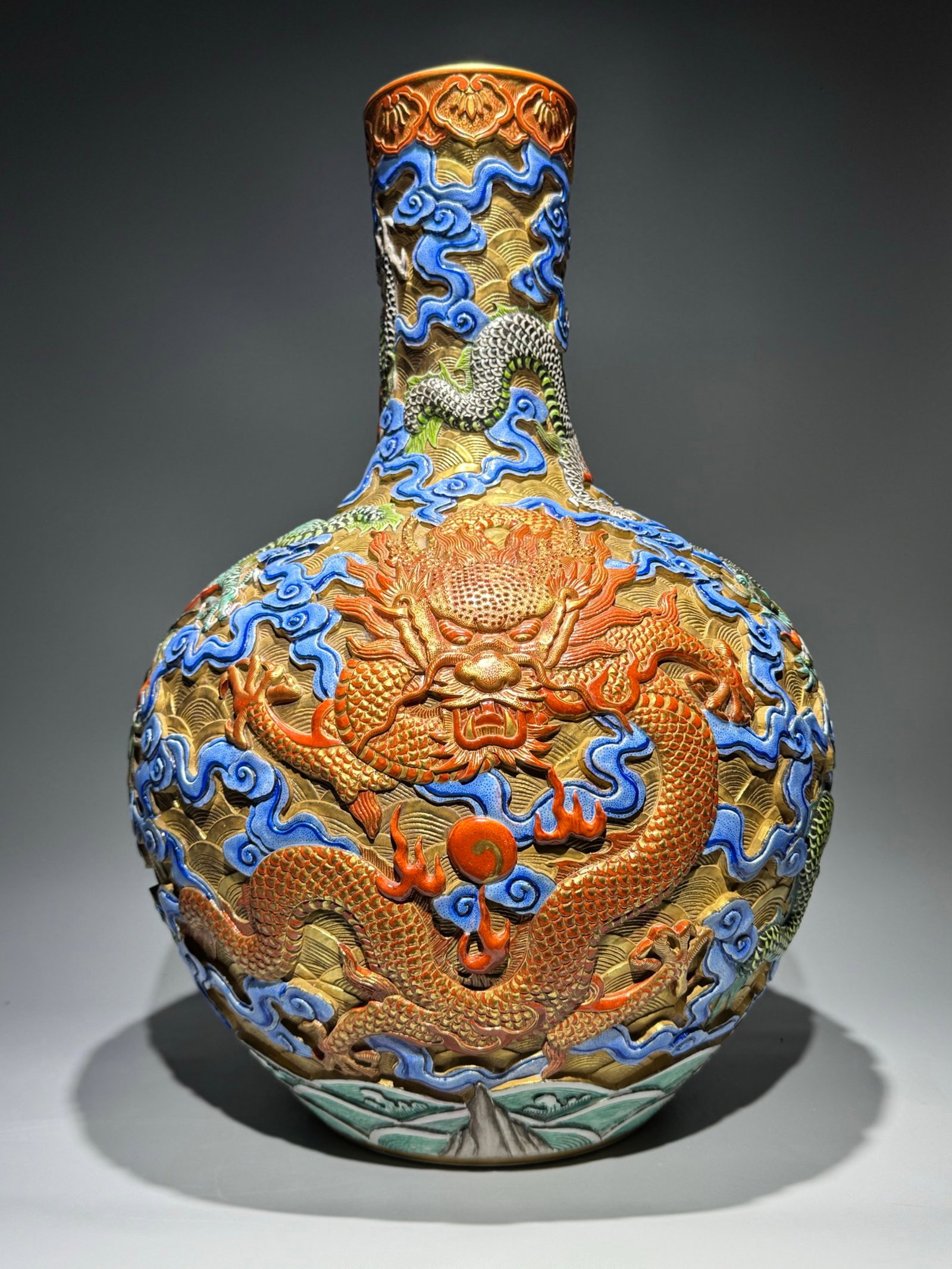An Exquisite Famille-Rose Gold Ground Auspicious Cloud and Dragon Pattern Vase: An Exquisite Famille-Rose Gold Ground Auspicious Cloud and Dragon Pattern Vase,Qing Dynasty,China,Qianlong Six-character Mark,Size:22inx15in 粉彩金地祥云龙