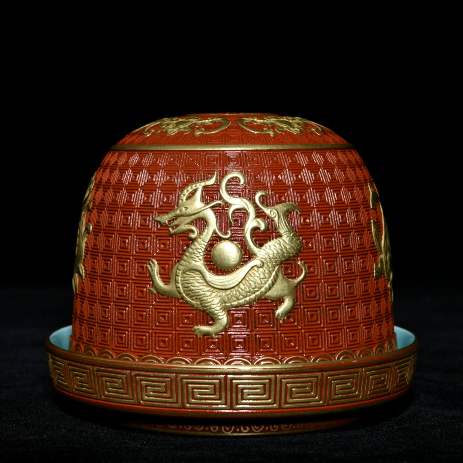 An Exquisite Coral Red Glazed Gilt Auspicious Beast Pattern Ornament: An Exquisite Coral Red Glazed Gilt Auspicious Beast Pattern Ornament,Qing Dynasty,China,Qianlong Six-character Mark,Size:3.5inx4.3in