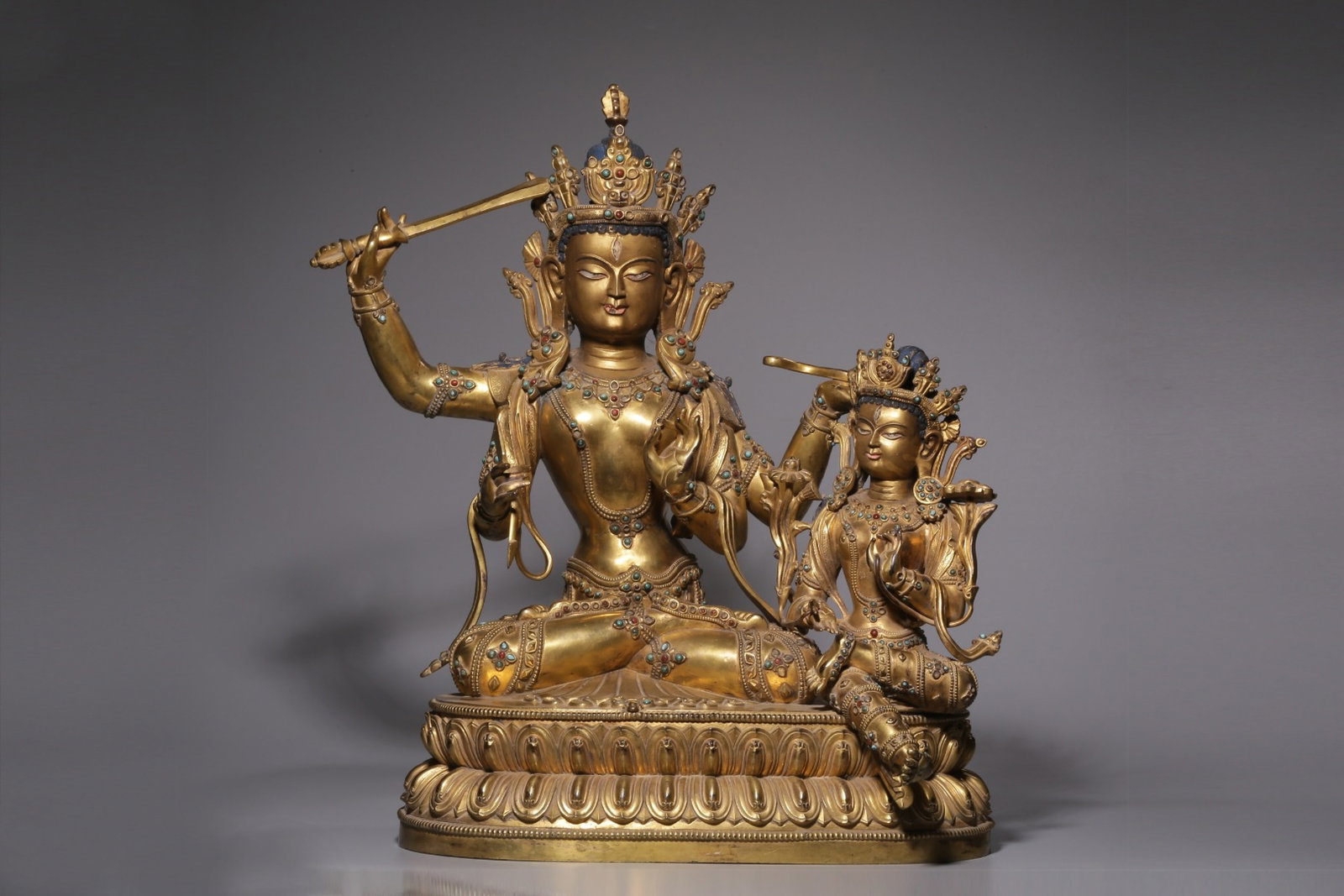 A Rare Gilt Bronze Statue of Manjusri: A Rare Gilt Bronze Statue of Manjusri,Qing Dynasty, China,Size:20.9inx15.4inx9.3in,Weight:24800g 铜鎏金文殊菩萨像,中国清代