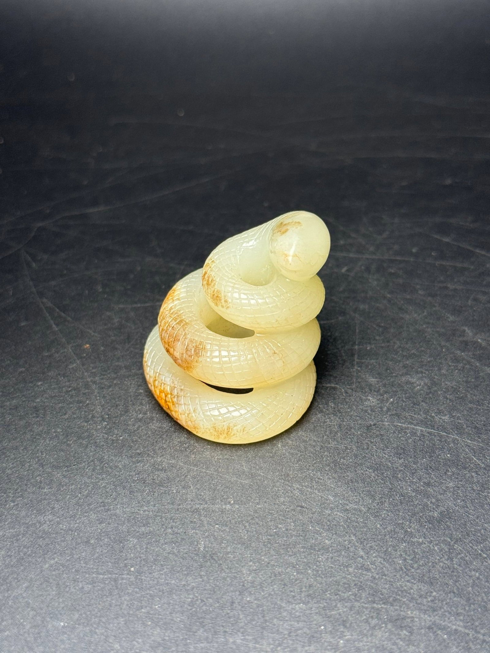 An Exquisite White Jade Snake Ornament: An Exquisite White Jade Snake Ornament,Qing Dynasty,China,Size:6mmx1mmx43mm,Weight:37g 白玉蛇摆件,中国清代