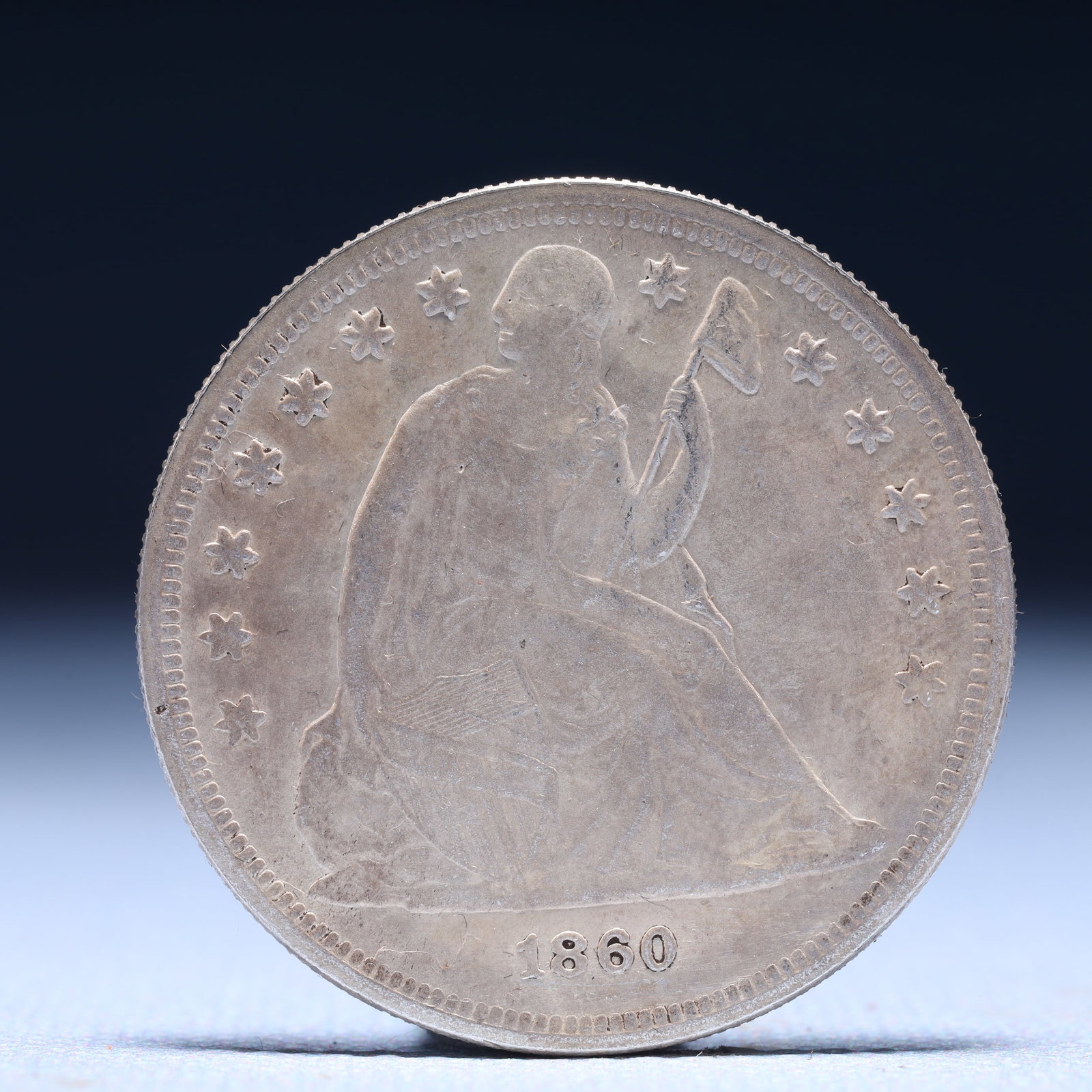 USA One Dollar 1860 Coin: American coin. IN GOD WE TRUST / LIBERTY / 1860 / UNITED STATES OF AMERICA / ONE DOL. Mint mark: O. Weight:26.9g.