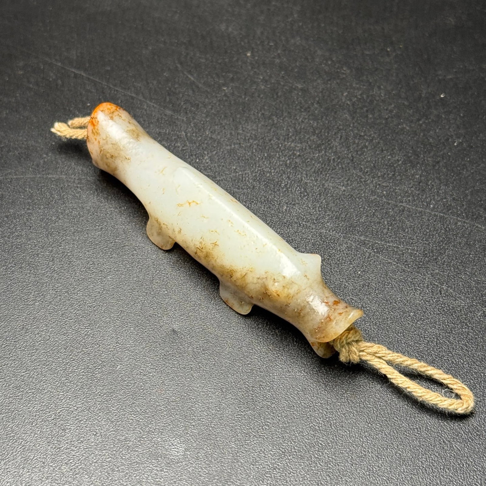 An Exquisite White Jade Fish Ornament: An Exquisite White Jade Fish Ornament,Qing Dynasty,China,Size:78mmx19mmx15mm,Weight:30g 白玉鱼摆件,中国清代