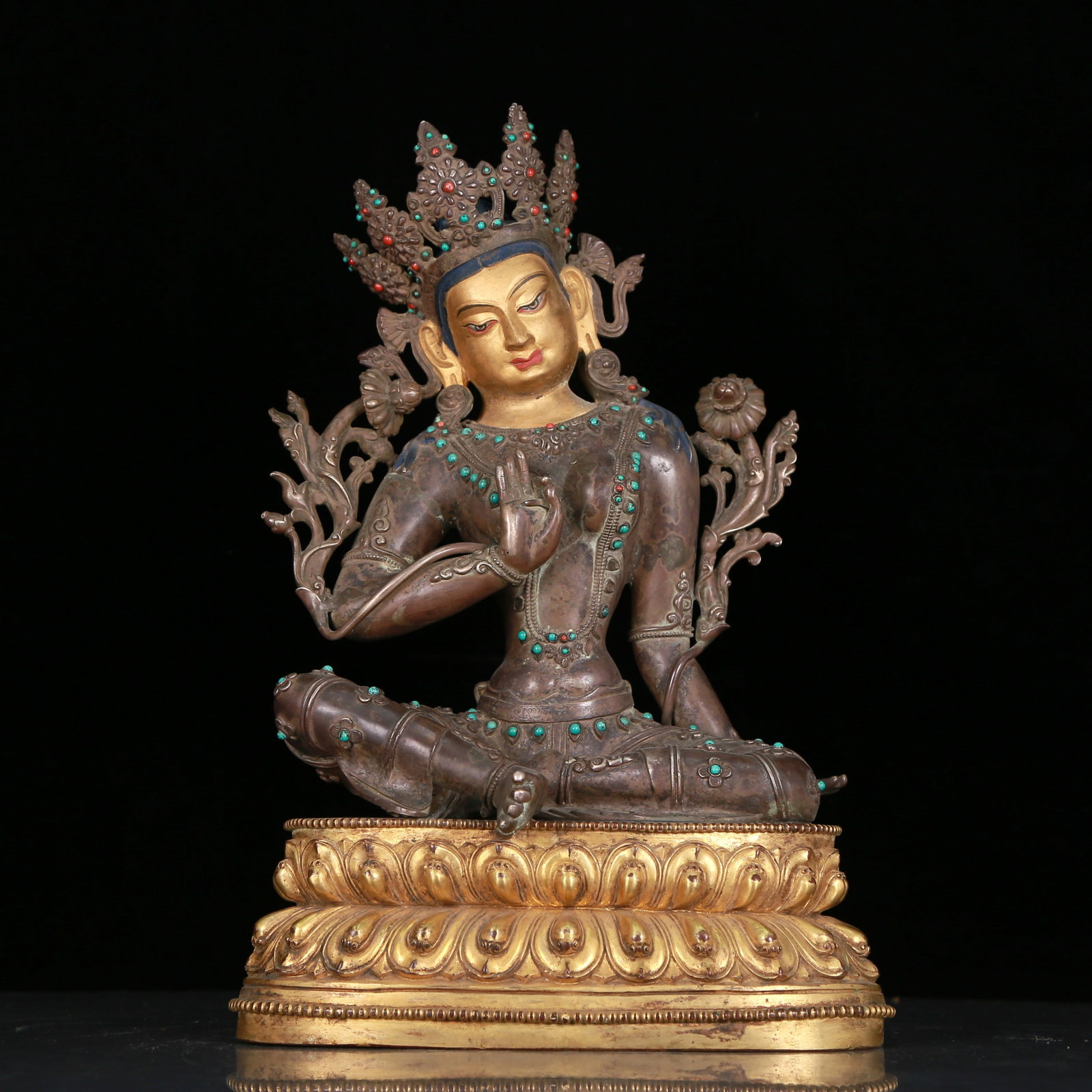A Fabulous Gilt-Bronze Silver Gem-Inlaid Figure Of Green Tara: A Fabulous Gilt-Bronze Silver Gem-Inlaid Figure Of Green Tara. Seated on a base with a peaceful expression, body adorned with jewelry ornaments, topknot surmounted by a splendid diadem, and leafy plan