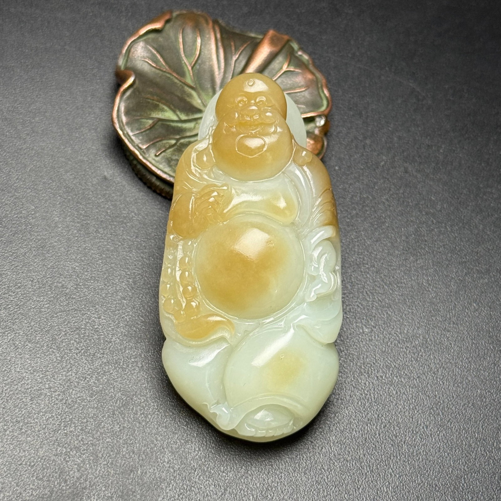 An Exquisite White Jade Statue of Maitreya Buddha Pendant: An Exquisite White Jade Statue of Maitreya Buddha Pendant,Qing Dynasty,China,Size:71mmx35mmx18mm,Weight:66g 白玉弥勒佛像挂件,中国清