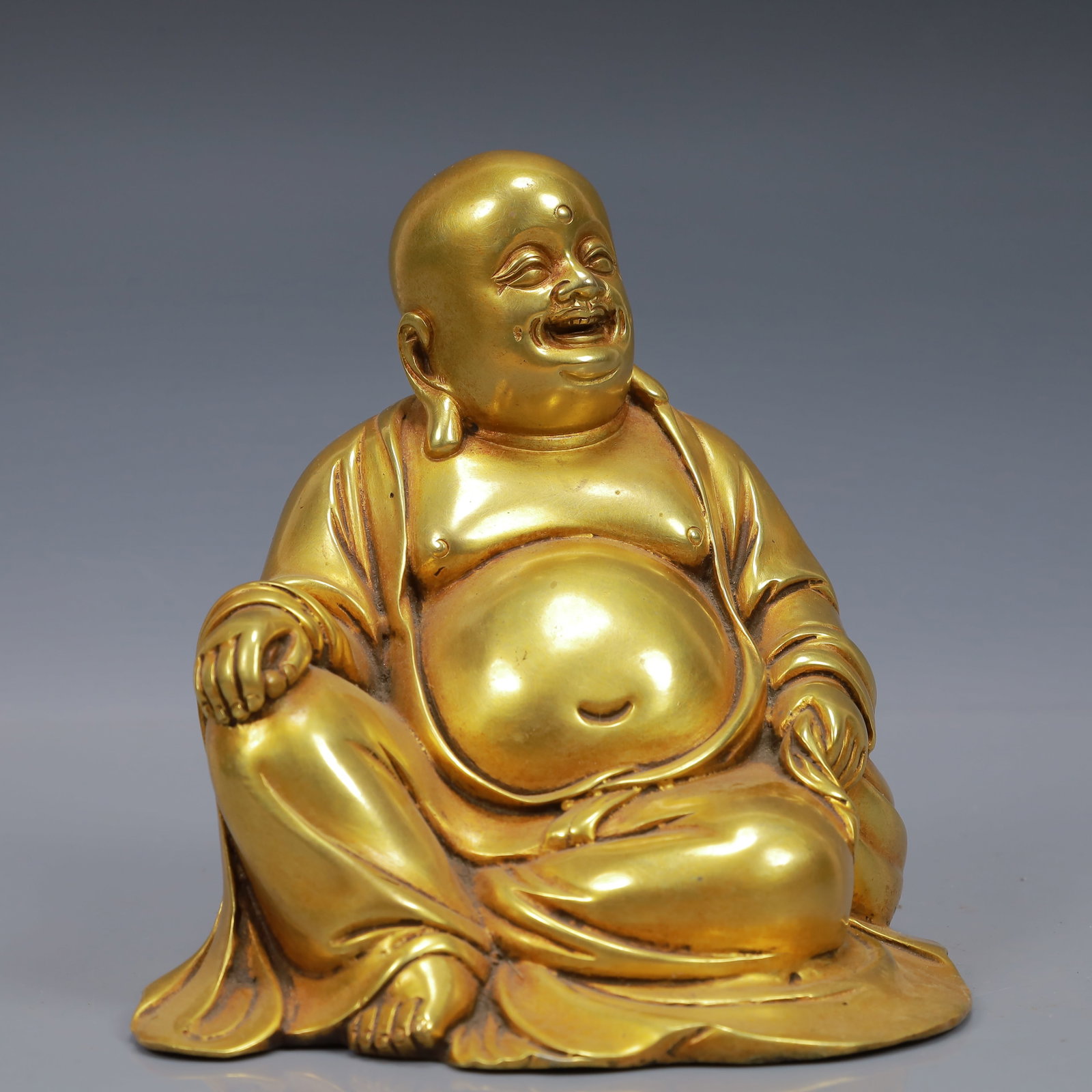 An Exquisite Gilt Bronze Statue of Maitreya Buddha: An Exquisite Gilt Bronze Statue of Maitreya Buddha,Ming Dynasty, China,Yongle Four-character Mark,Size:5.5inx4.7inx5.9in,Weight:2500g 铜鎏金弥勒佛像,中&