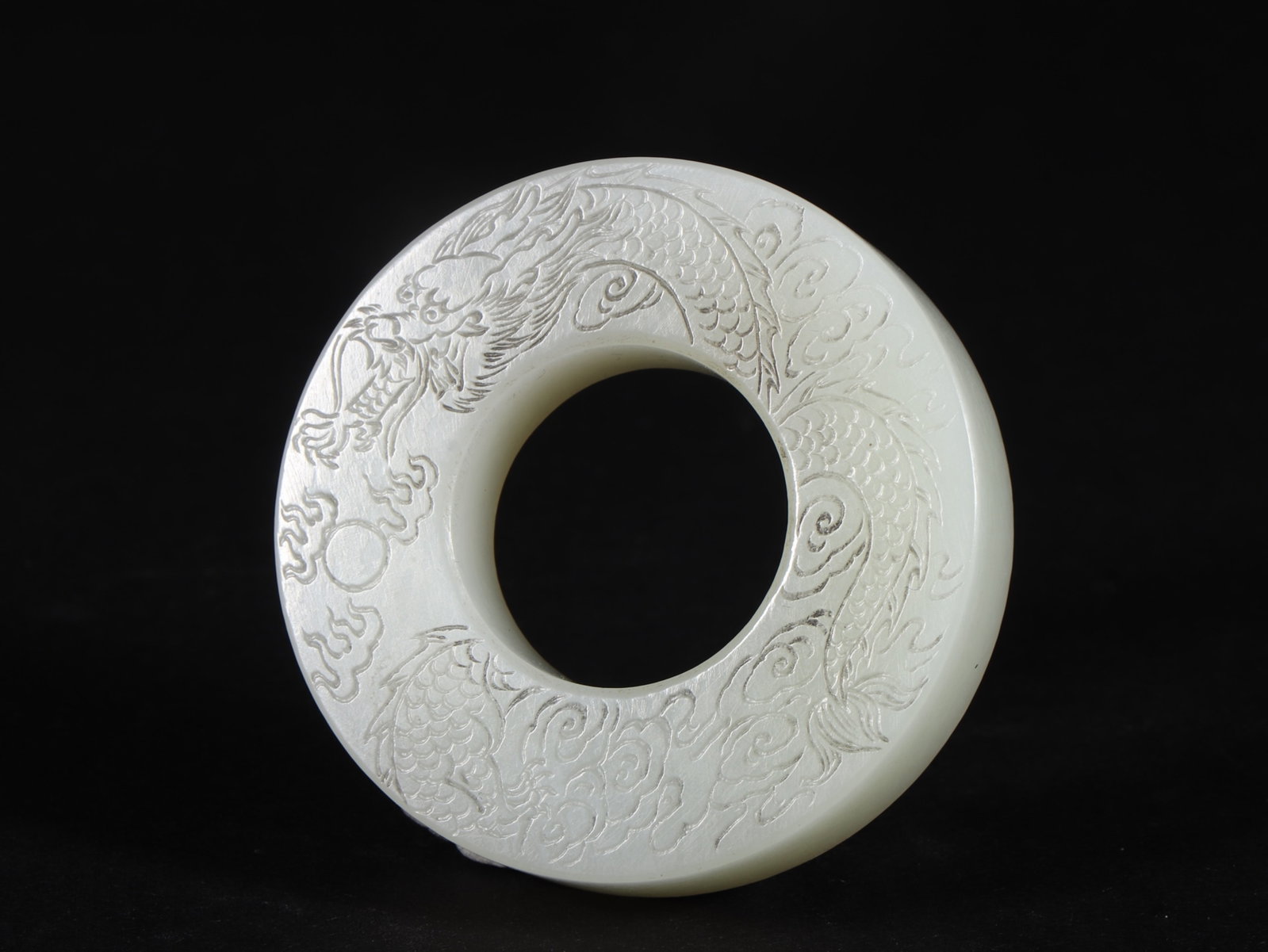 An Exquisite White Jade Auspicious Cloud and Dragon Pattern Pendant,with poem: An Exquisite White Jade Auspicious Cloud and Dragon Pattern Pendant,with poem,Qing Dynasty,China,Size:2.1inx0.5in,Weight:64g 白玉祥云龙纹挂件,带&#