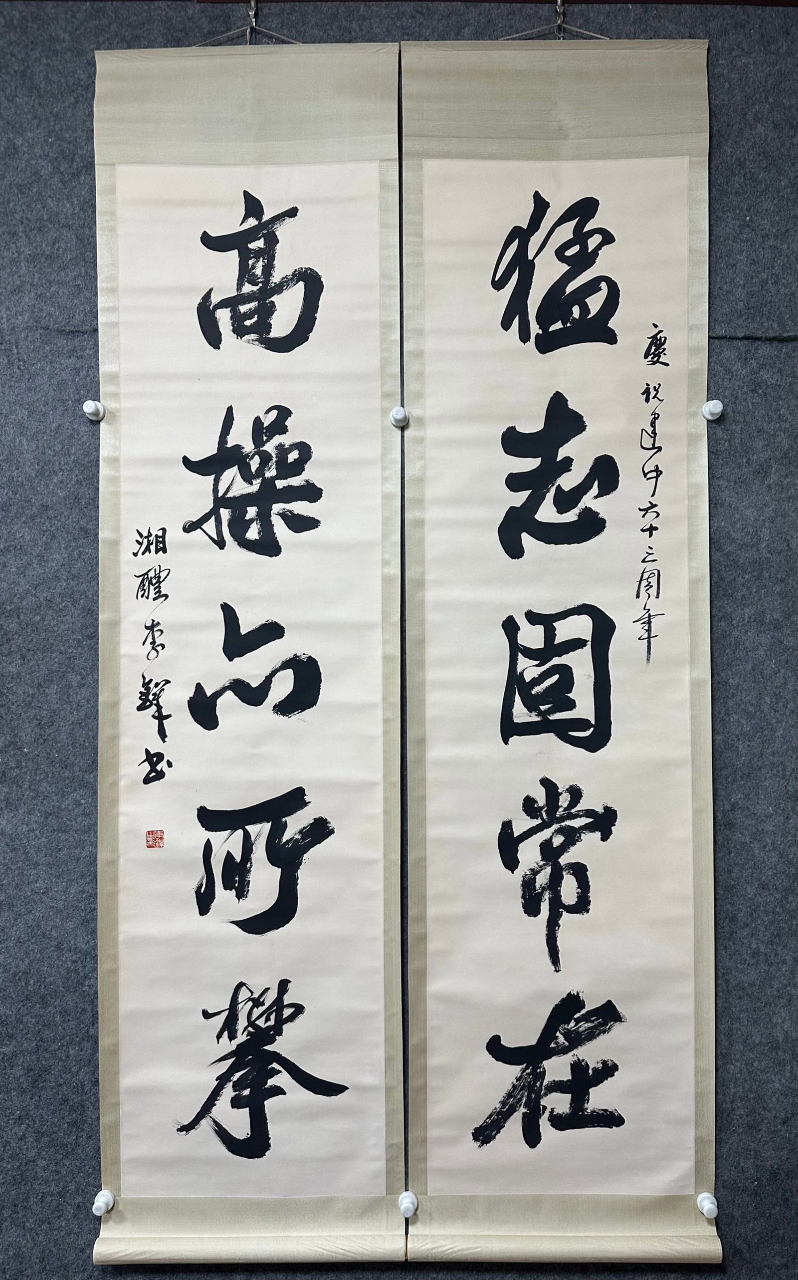 A Chinese Vertical Scroll Ink Calligraphy Couplet on Paper: A Chinese Vertical Scroll Ink Calligraphy Couplet on Paper,Li Duo,Size:18.1inx69.7in*2 一副中国水墨书法对联立轴,李铎