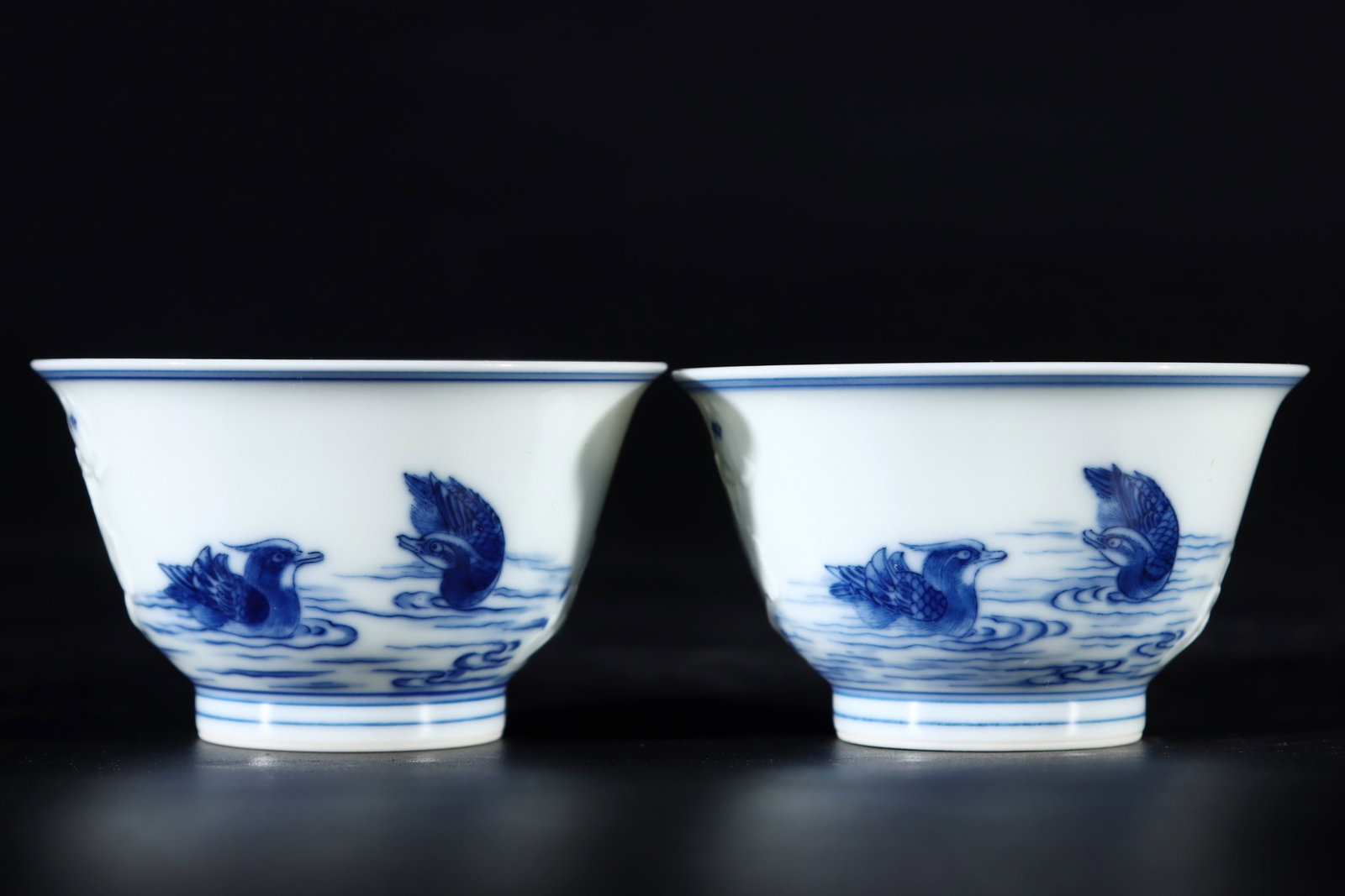 A Pair of Exquisite Blue and White Flower and Mandarin Duck Pattern Cups: A Pair of Exquisite Blue and White Flower and Mandarin Duck Pattern Cups,Qing Dynasty,China,Yongzheng Six-character Mark,Size:1.8inx3in 一对青花花卉鸳鸯