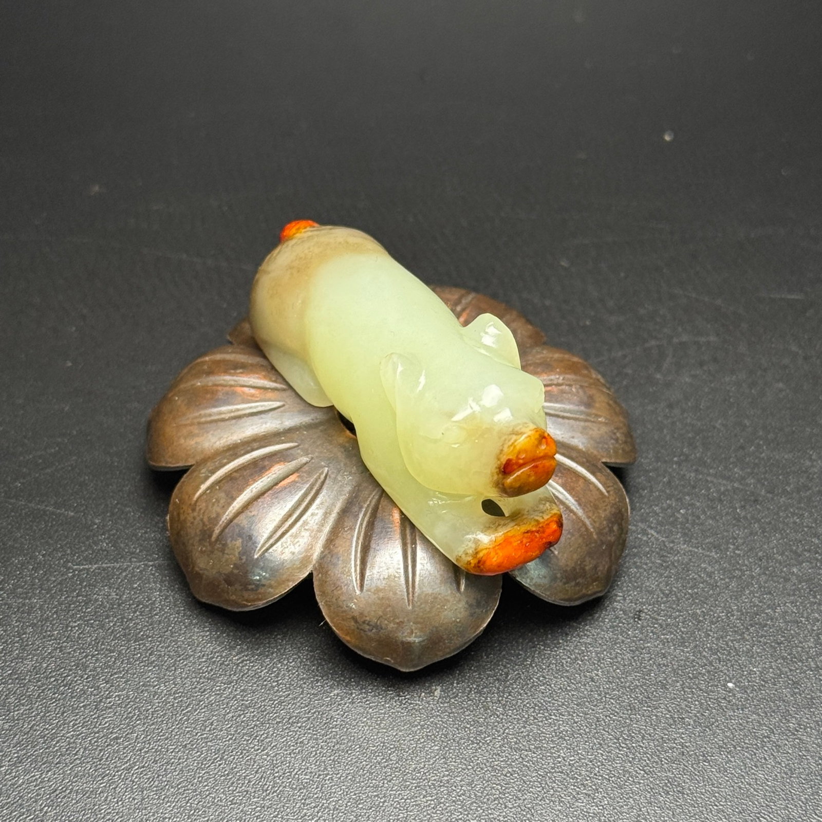 An Exquisite White Jade Beast Ornament: An Exquisite White Jade Beast Ornament,Qing Dynasty,China,Size:54mmx21mmx17mm,Weight:36g 白玉兽摆件,中国清代