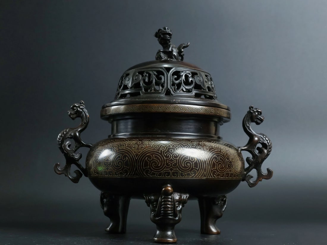 An Exquisite Bronze Inlaid Silver Flower Pattern Dragon-Ears and Elephant-Legs Censer: An Exquisite Bronze Inlaid Silver Flower Pattern Dragon-Ears and Elephant-Legs Censer,Qing Dynasty, China, With Mark,Size:7.9inx5in,Weight:3730g