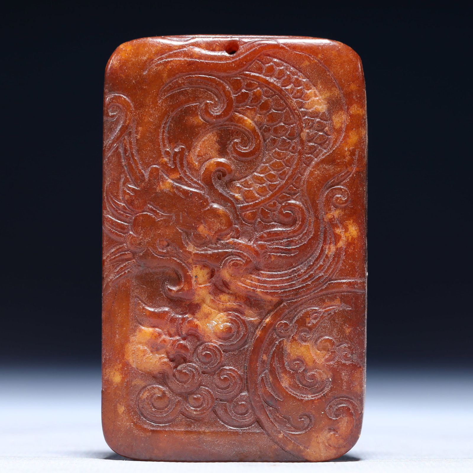 An Exquisite Archaic Jade Dragon Pattern Pendant: An Exquisite Archaic Jade Dragon Pattern Pendant,Ancient Time,China,Size:1.8inx0.4inx3.1in,Weight:106g 高古玉龙纹牌,中国远古时期