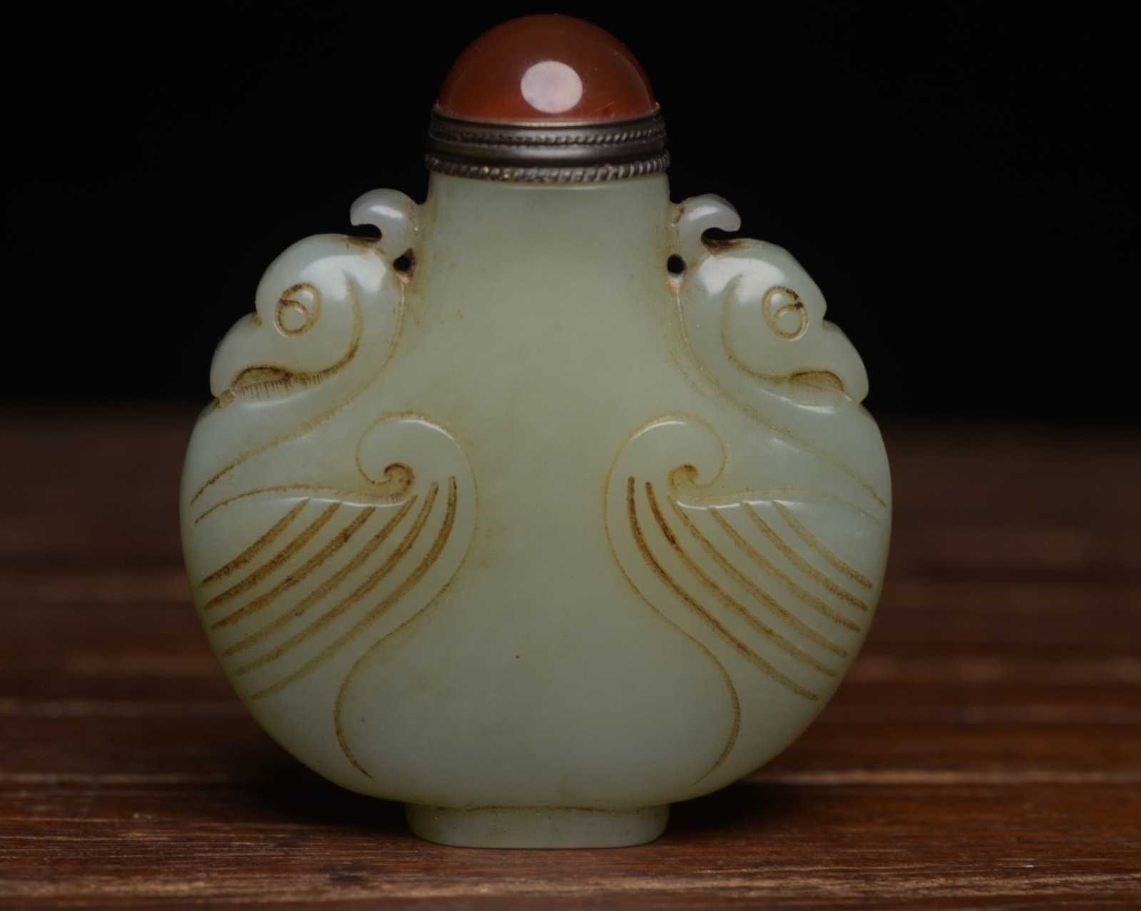 An Exquisite White Jade Phoenix Pattern Snuff Bottle: An Exquisite White Jade Phoenix Pattern Snuff Bottle,Qing Dynasty,China,Size:2.4inx2.1inx0.7in,Weight:77g 白玉凤纹鼻烟壶,中国清代
