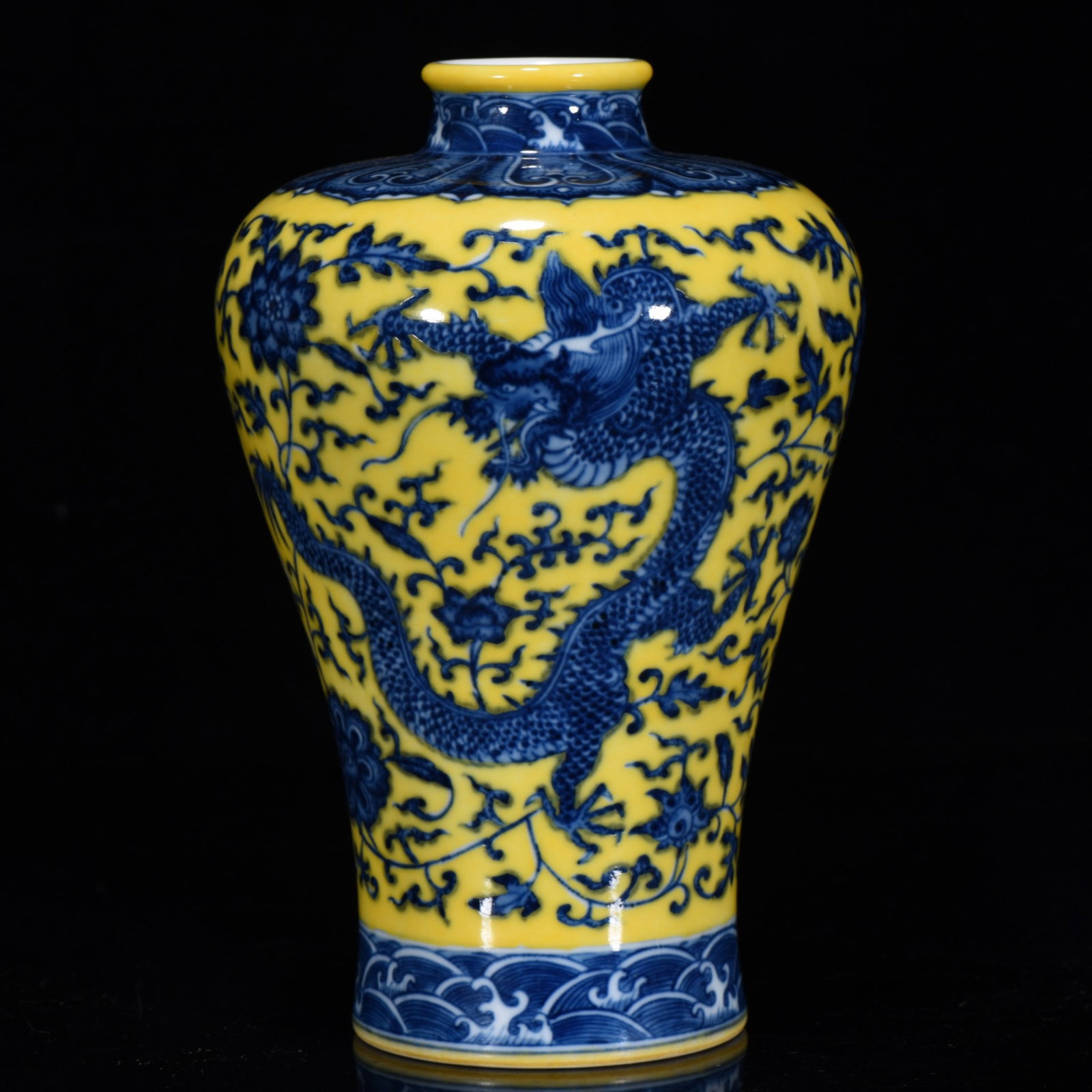 An Exquisite Yellow Glazed Blue and White Lotus and Dragon Pattern Vase: An Exquisite Yellow Glazed Blue and White Lotus and Dragon Pattern Vase,Qing Dynasty,China,Qianlong Six-Character Mark,Size:7.1inx6.3in 黄釉青花缠枝莲龙