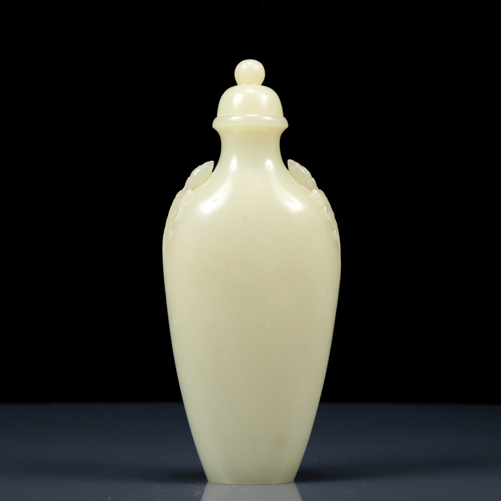 An Exquisite Greenish Jade Double-ears Vase with cover: An Exquisite Greenish Jade Double-ears Vase with cover，Qing Dynasty, China，Size:3.1inx1.6inx7.5in，Weight:255g