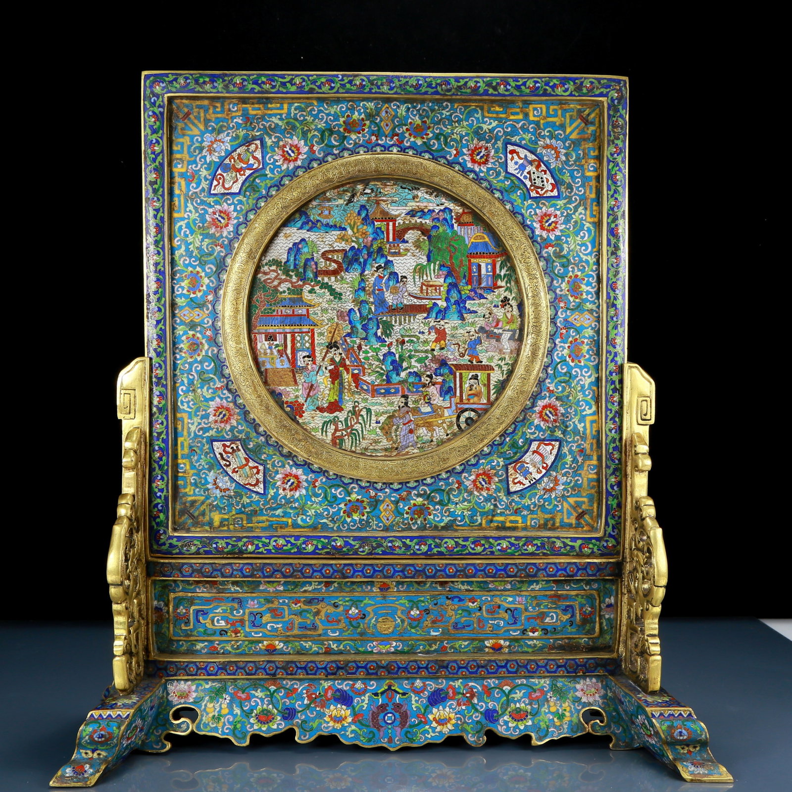 A rare cloisonné 'landscape and figures' table screen: A precious cloisonné table screen with landscape and figure patterns. The application of filigree technology makes the decoration of this collection more refined and three-dimensional. This colle