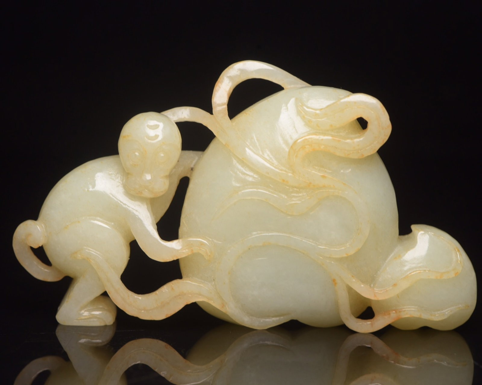 An Exquisite White Jade Monkey Ornament: An Exquisite White Jade Monkey Ornament,Qing Dynasty,China,Size:3.7inx2.1inx0.8in,Weight:119g 白玉猴子摆件,中国清代