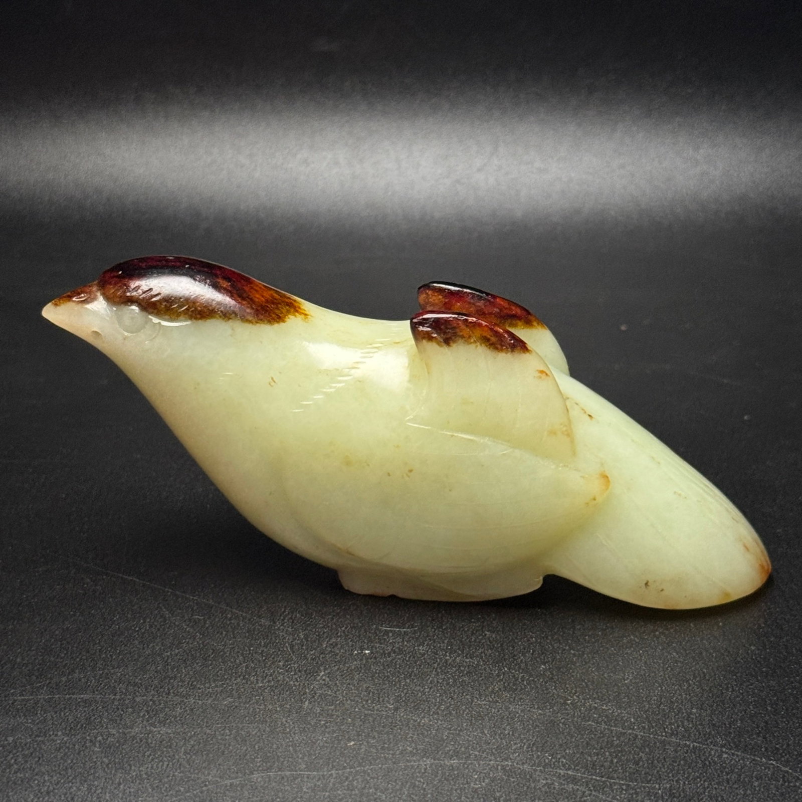 An Exquisite White Jade Bird Hand Piece: An Exquisite White Jade Bird Hand Piece,Qing Dynasty,China,Size:118mmx57mmx30mm,Weight:225g 白玉鸟手把件,中国清代