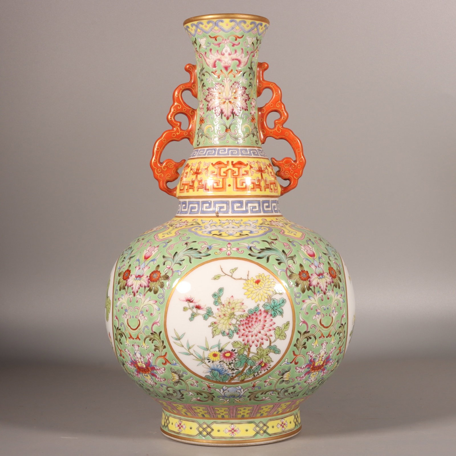 A Rare Enamel Green Ground Lotus Pattern Double-Ears Vase: A Rare Enamel Green Ground Lotus Pattern Double-Ears Vase,Qing Dynasty,China,Qianlong Six-character Mark,Size:13.8inx7.9in