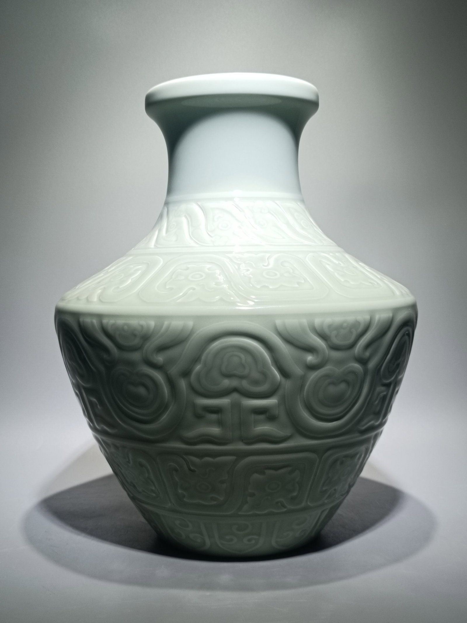 A Rare Celadon Glazed Dragon Pattern Vase: A Rare Celadon Glazed Dragon Pattern Vase,Qing Dynasty,China,Qianlong Six-character Mark,Size:15inx12.2in 粉青釉龙纹瓶,中国清代,乾&