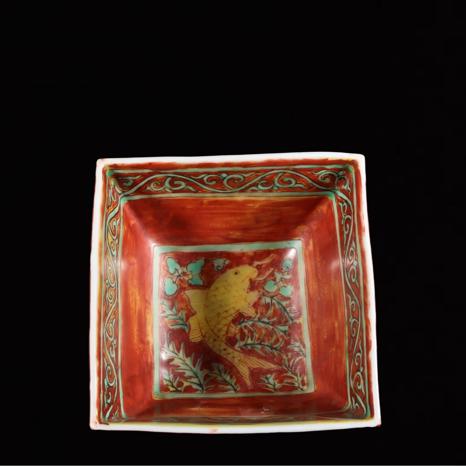 An Exquisite Red Ground Yellow Glazed Auspicious Cloud and Dragon Pattern Jar (1 of 9)