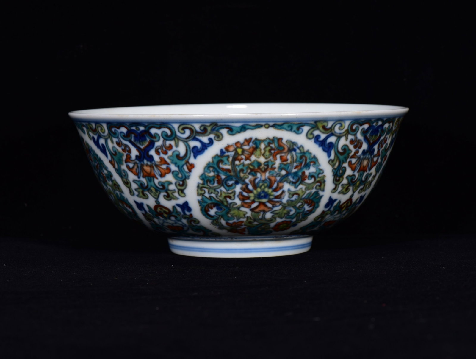 An Exquisite Doucai Lotus Pattern Bowl: An Exquisite Doucai Lotus Pattern Bowl,Qing Dynasty,China,Qianlong Six-character Mark,Size:3.1inx7.1in 斗彩缠枝莲纹碗,中国清代,乾