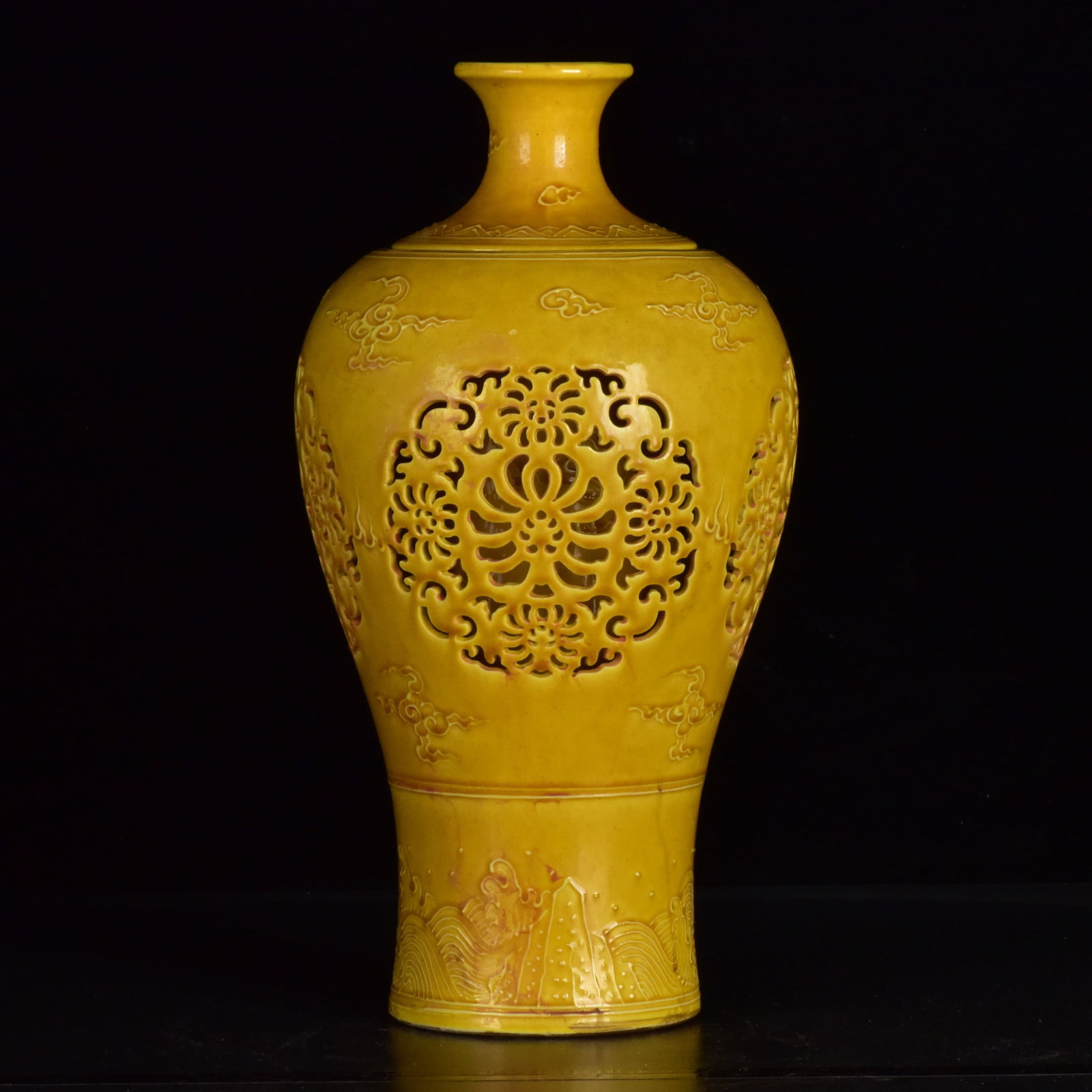 An Exquisite Yellow Glazed Hollow Auspicious Cloud Pattern Vase: An Exquisite Yellow Glazed Hollow Auspicious Cloud Pattern Vase,Ming Dynasty,China,Hongzhi Six-Character Mark,Size:11inx5.9in 黄釉镂空祥云纹瓶,中&