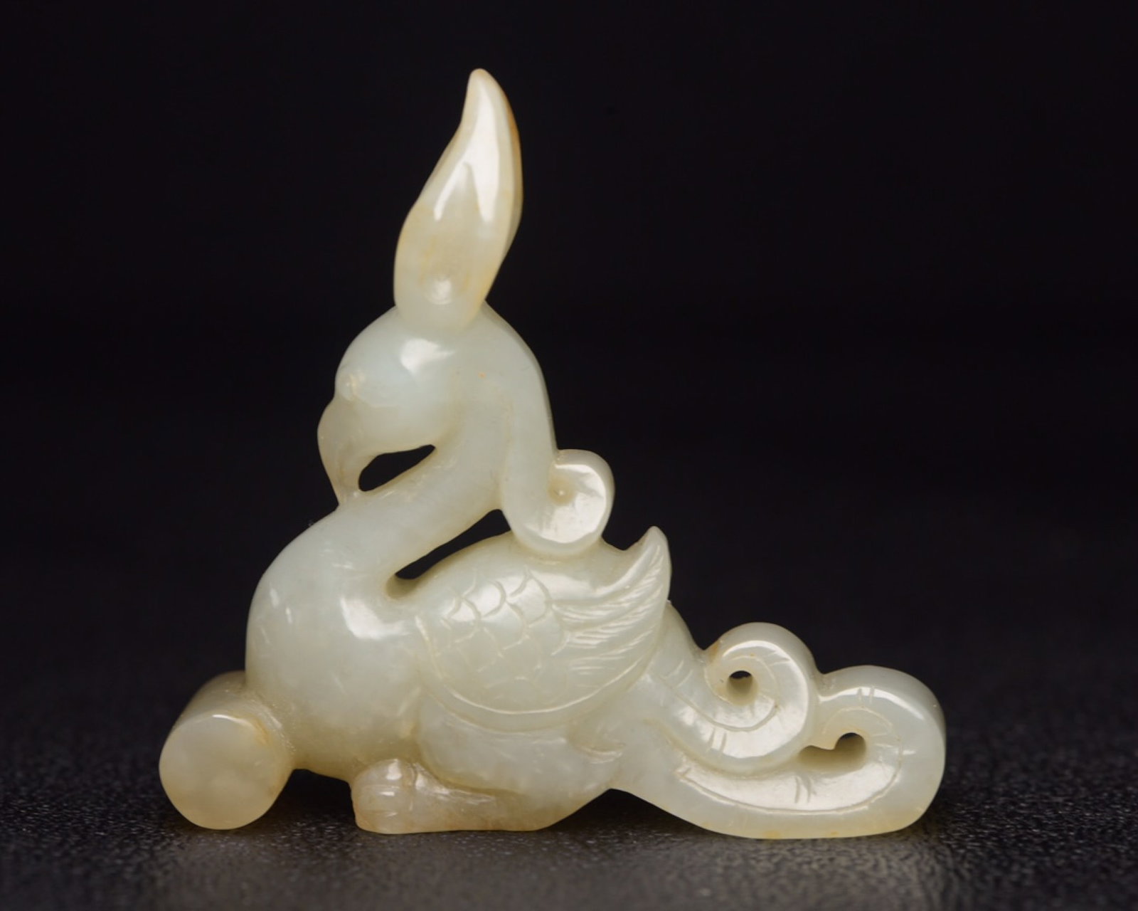 An Exquisite White Jade Phoenix Ornament: An Exquisite White Jade Phoenix Ornament,Qing Dynasty,China,Size:2.4inx2.2inx0.6in,Weight:40g 白玉凤摆件,中国清代