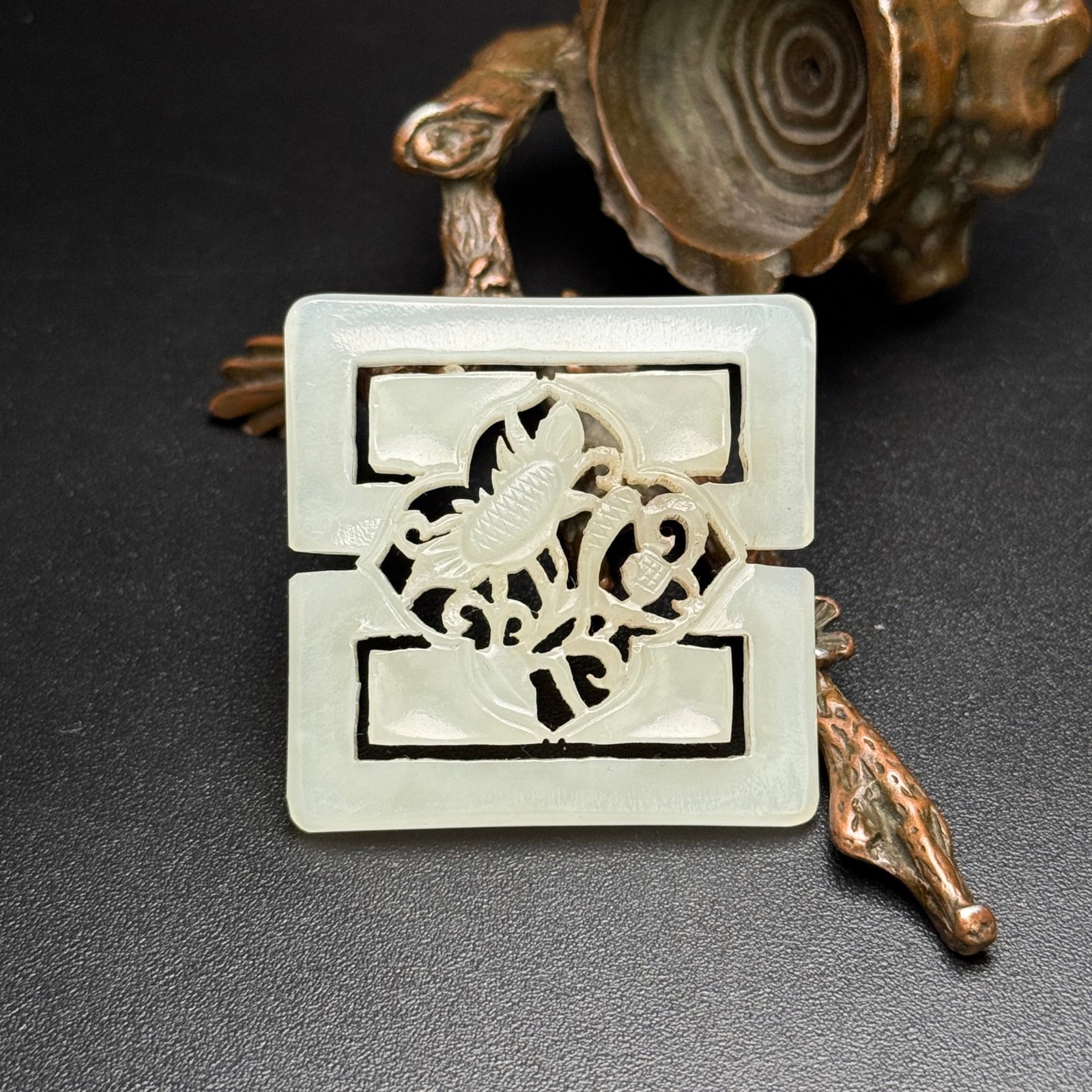 An Exquisite White Jade Flower Pattern Pendant: An Exquisite White Jade Flower Pattern Pendant,Qing Dynasty,China,Size:41mmx41mmx5mm,Weight:17g 白玉花卉纹佩,中国清代