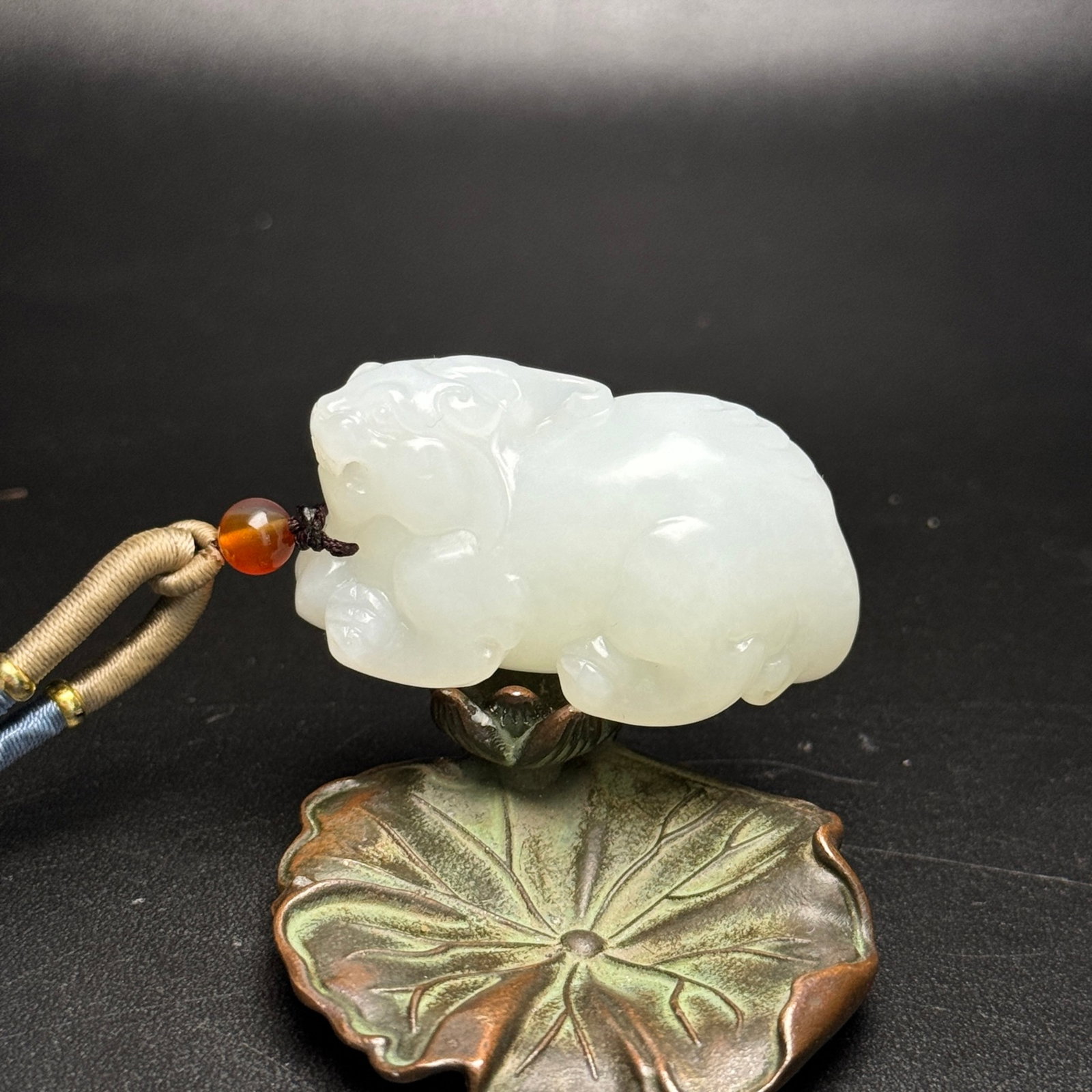 An Exquisite White Jade Wealth-Attracting Creature Ornament: An Exquisite White Jade Wealth-Attracting Creature Ornament,Qing Dynasty,China,Size:48mmx24mmx26mm,Weight:50g 白玉貔貅摆件,中国清代