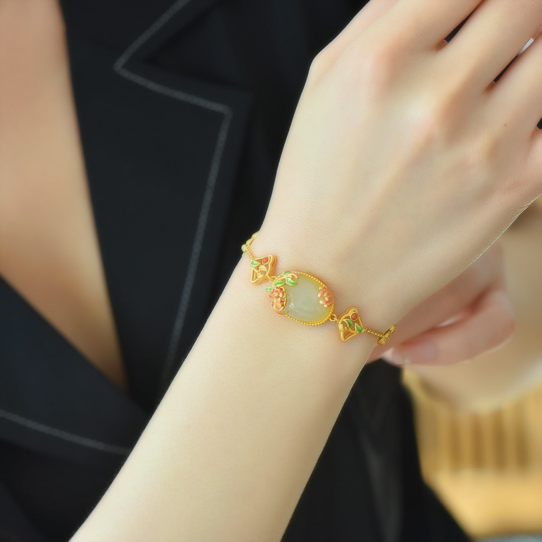 An Exquisite Sterling Silver-Gold Plated Inlaid White Jade Bracelets: An Exquisite Sterling Silver-Gold Plated Inlaid White Jade Bracelets,Size:13mmx18mm 纯银镀金镶白玉手链