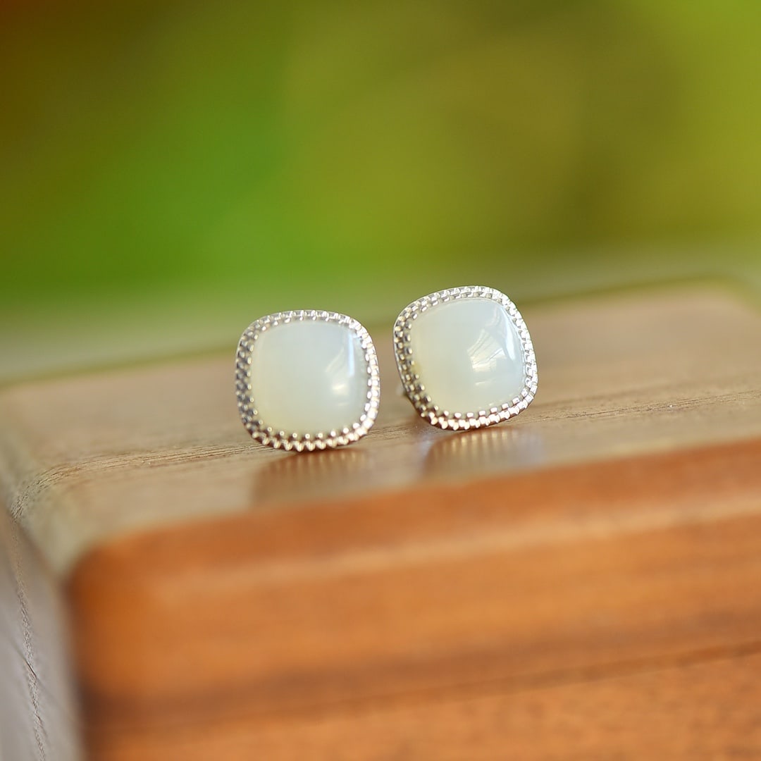 A Pair of Exquisite Sterling Silver Inlaid White Jade Earrings: A Pair of Exquisite Sterling Silver Inlaid White Jade Earrings,Size:8mmx8mm 一对纯银镶白玉耳钉