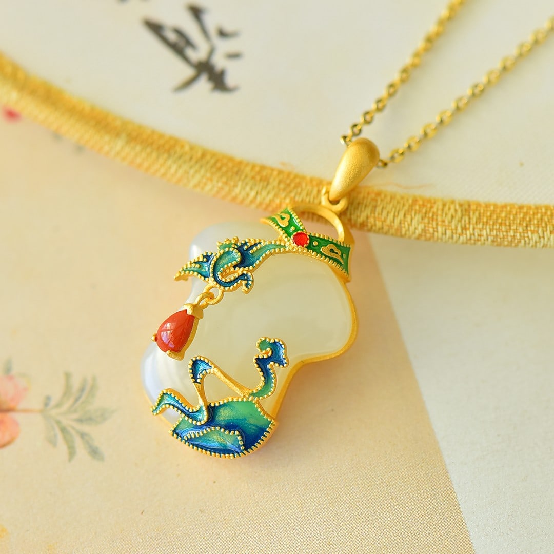 An Exquisite Sterling Silver-Gold Plated Inlaid White Jade Pendant: An Exquisite Sterling Silver-Gold Plated Inlaid White Jade Pendant 纯银镀金镶白玉吊坠