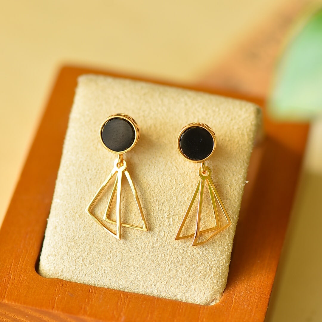 A Pair of Exquisite Sterling Silver-Gold Plated Inlaid Black Jade Earrings: A Pair of Exquisite Sterling Silver-Gold Plated Inlaid Black Jade Earrings,Size:8mmx24mm 一对纯银镀金镶墨玉耳环