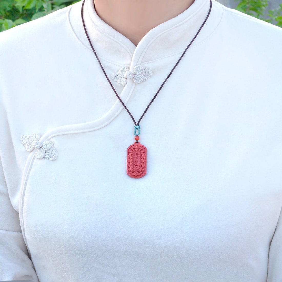 An Exquisite Cinnabar Flower Pattern Pendant: An Exquisite Cinnabar Flower Pattern Pendant,Size:20mmx40mm,Weight:12g 朱砂花卉纹挂件