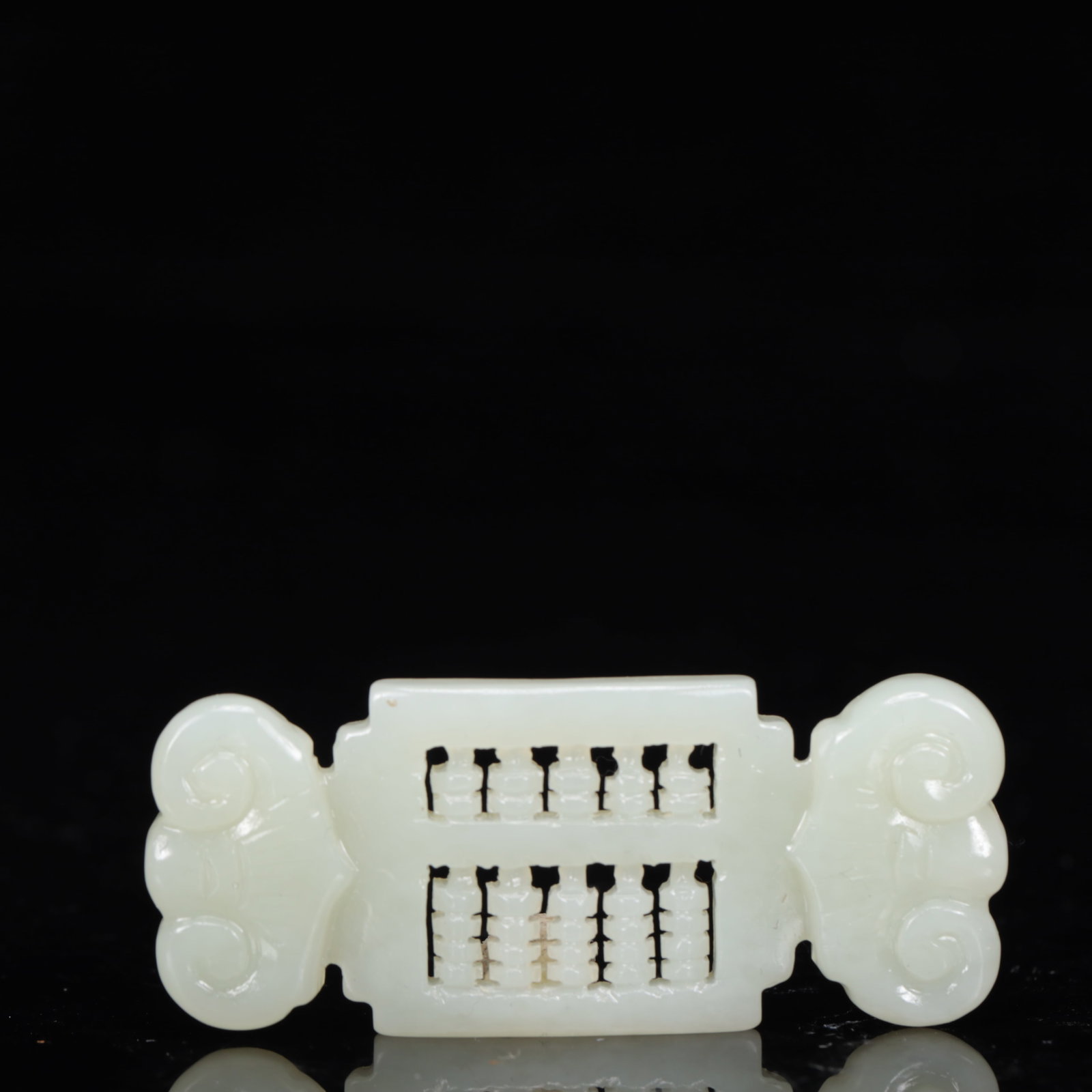 An Exquisite White Jade Abacus Pendant: An Exquisite White Jade Abacus Pendant,Qing Dynasty, China,Size:1inx0.2inx2.2in,Weight:15g 白玉算盘挂件,中国清代