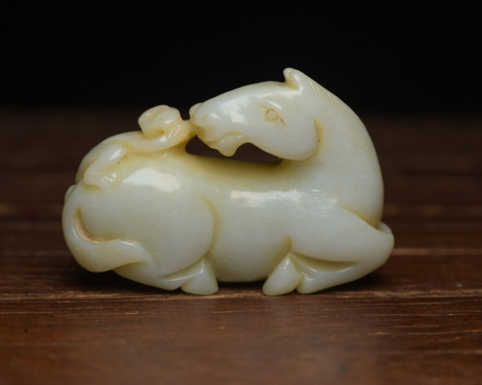 An Exquisite White Jade Horse Ornament: An Exquisite White Jade Horse Ornament,Qing Dynasty,China,Size:2.2inx1.5inx0.8in,Weight:56g 白玉骏马摆件,中国清代