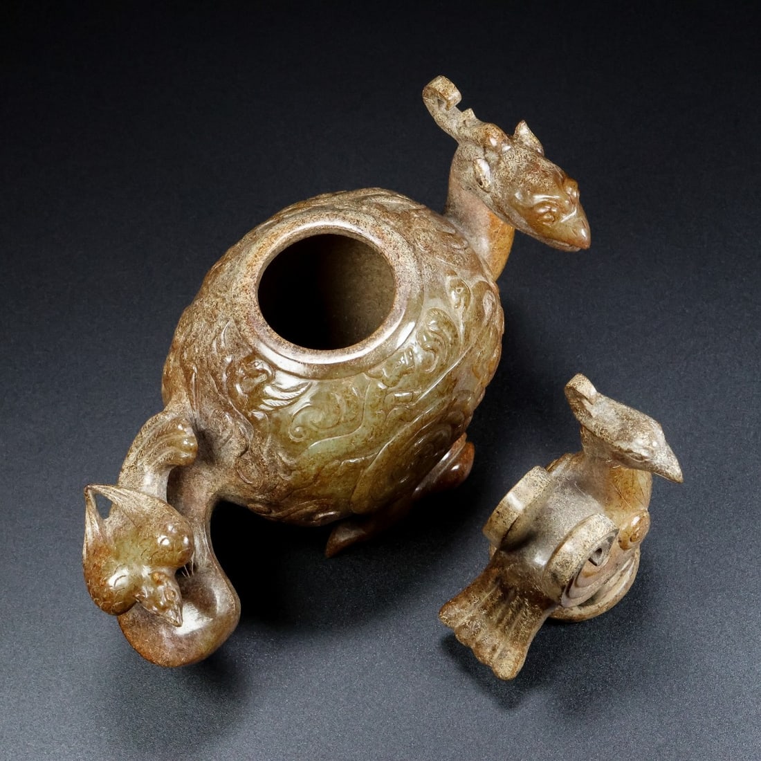 An Exquisite White Jade Dragon and Phoenix Pattern Phoenix Pot: An Exquisite White Jade Dragon and Phoenix Pattern Phoenix Pot,Qing Dynasty,China,Size:6.3inx2.8inx6.7in,Weight:768g 白玉龙凤纹凤壶,中国清&#