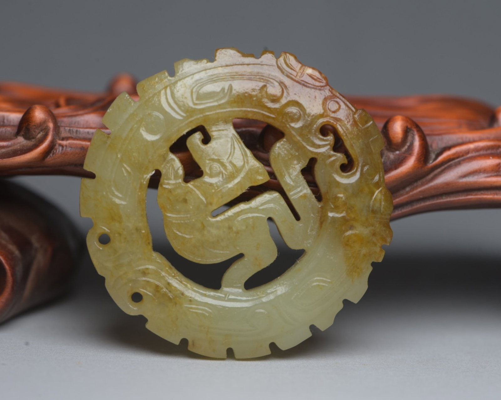 An Exquisite White Jade Beast Pendant: An Exquisite White Jade Beast Pendant,Qing Dynasty,China,Size:1.9inx1.9inx0.3in,Weight:30g 白玉兽佩,中国清代