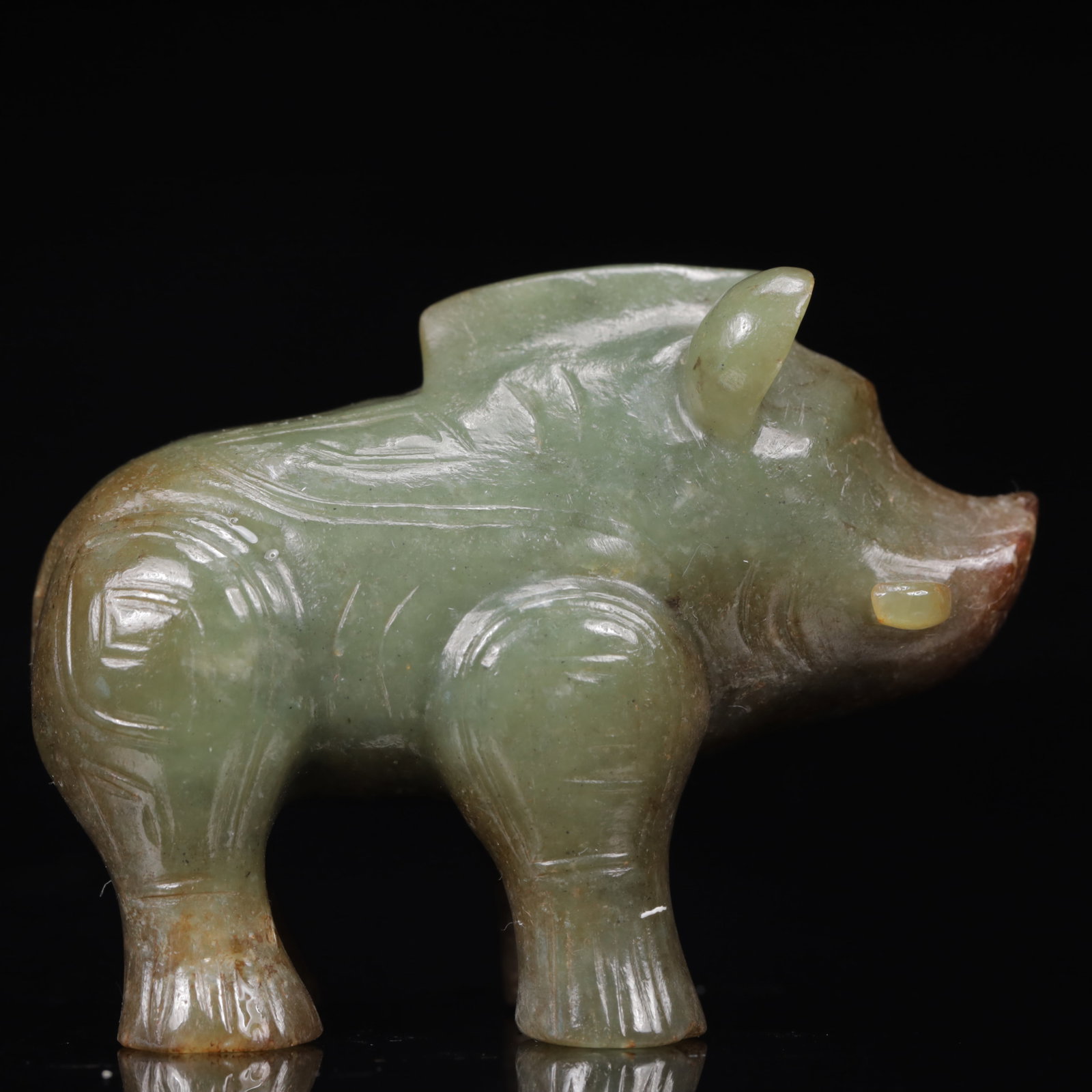 An Exquisite Green Jade Pig Ornament: An Exquisite Green Jade Pig Ornament,Qing Dynasty,China,Size:2.8inx1.6inx2.4in,Weight:160g 青玉猪摆件,中国清代